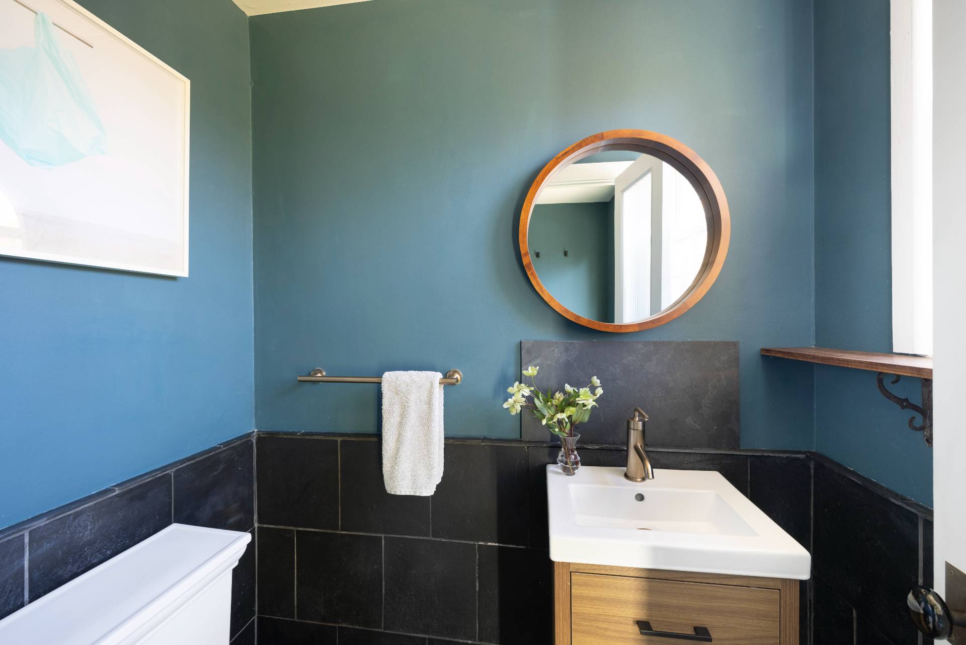 11 Cove Avenue East Sag Harbor, NY 11963 - Photo 11 of 19 a bathroom with a sink and a mirror