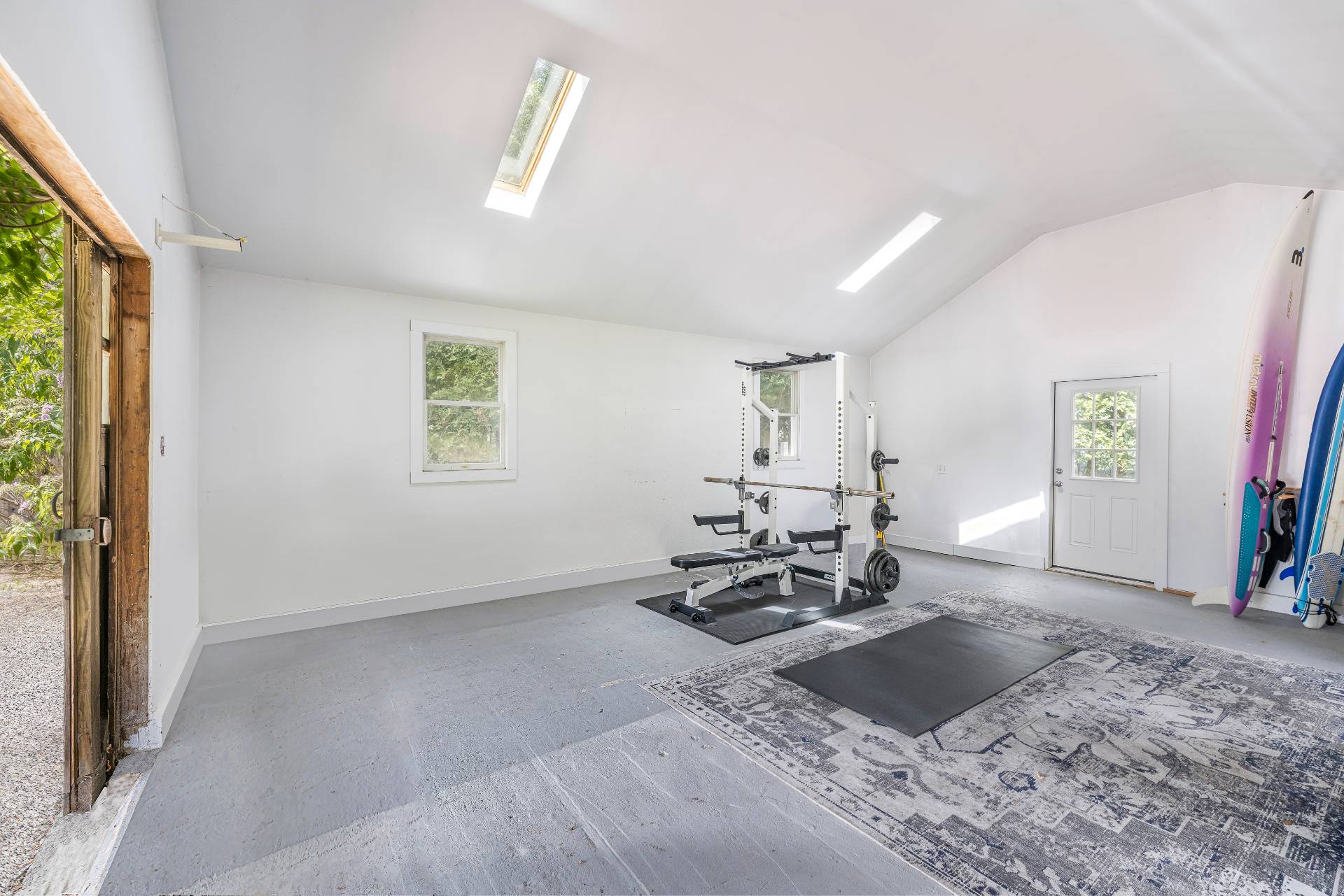 11 Cove Avenue East Sag Harbor, NY 11963 - Photo 15 of 19 a view of a livingroom with furniture and a window