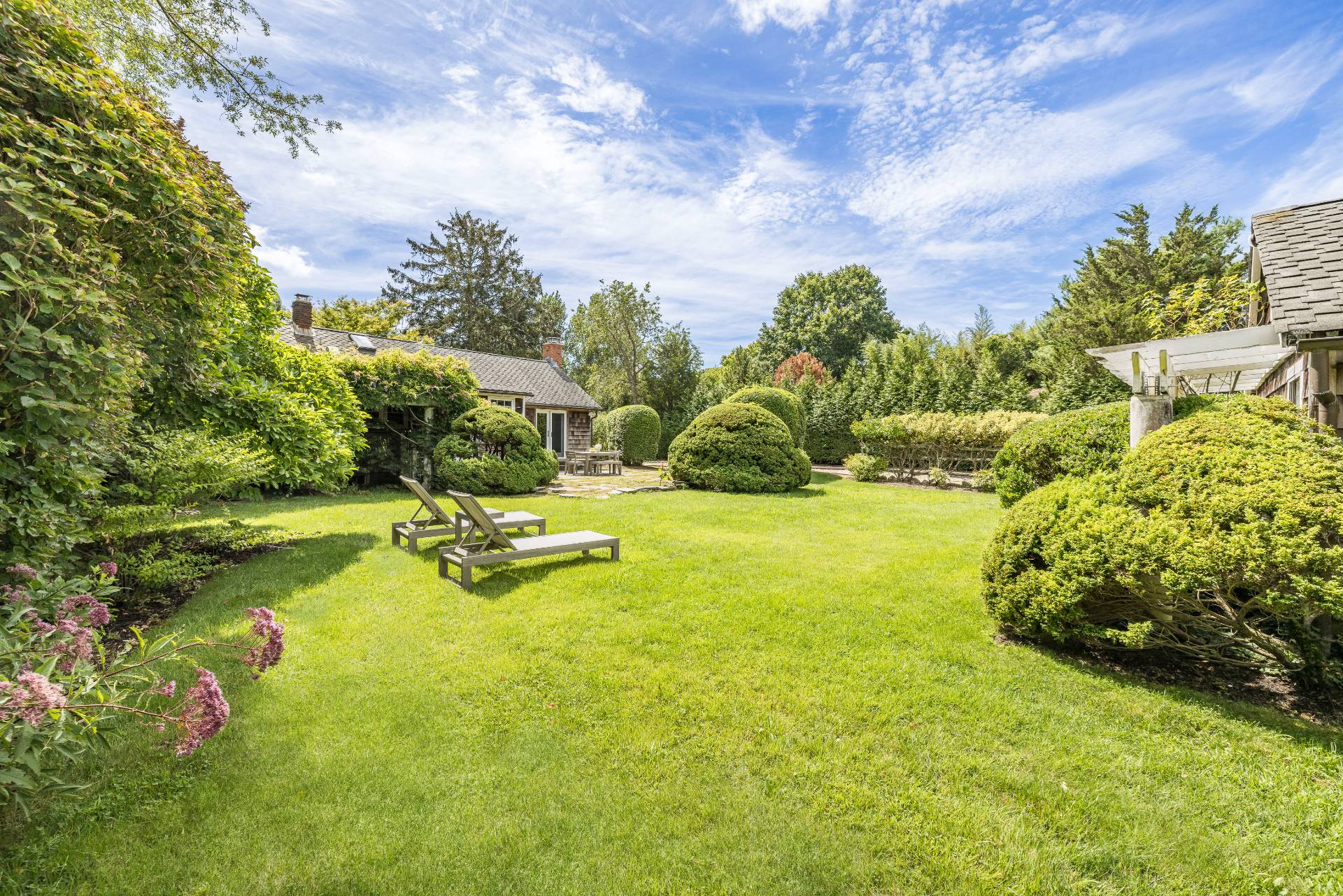 11 Cove Avenue East Sag Harbor, NY 11963 - Photo 2 of 19 a view of swimming pool with garden
