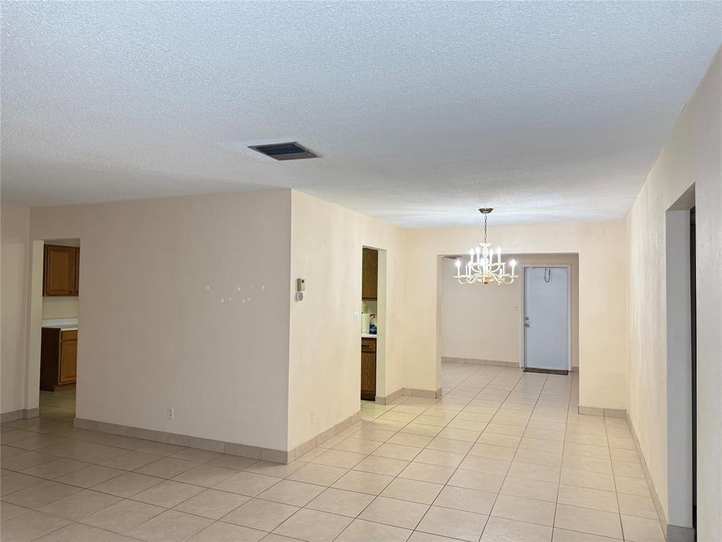 7508 Northwest 67th Avenue Tamarac, FL 33321 - Photo 2 of 17 a view of a livingroom with an empty space