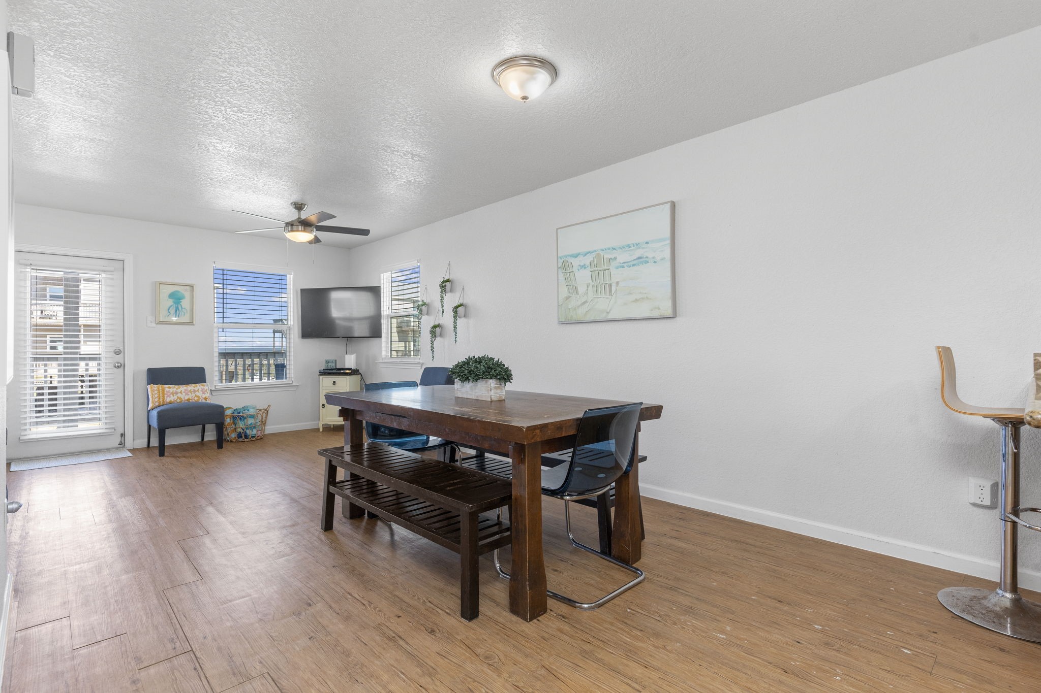 111 Howard Avenue Surfside Beach, TX 77541 - Photo 19 of 33 a room with furniture and wooden floor