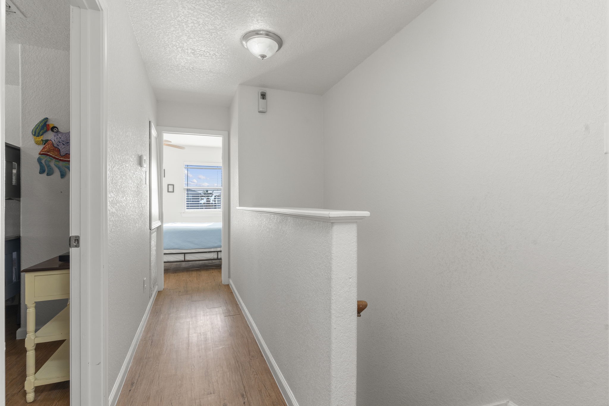 111 Howard Avenue Surfside Beach, TX 77541 - Photo 25 of 33 wooden floor in a gallery