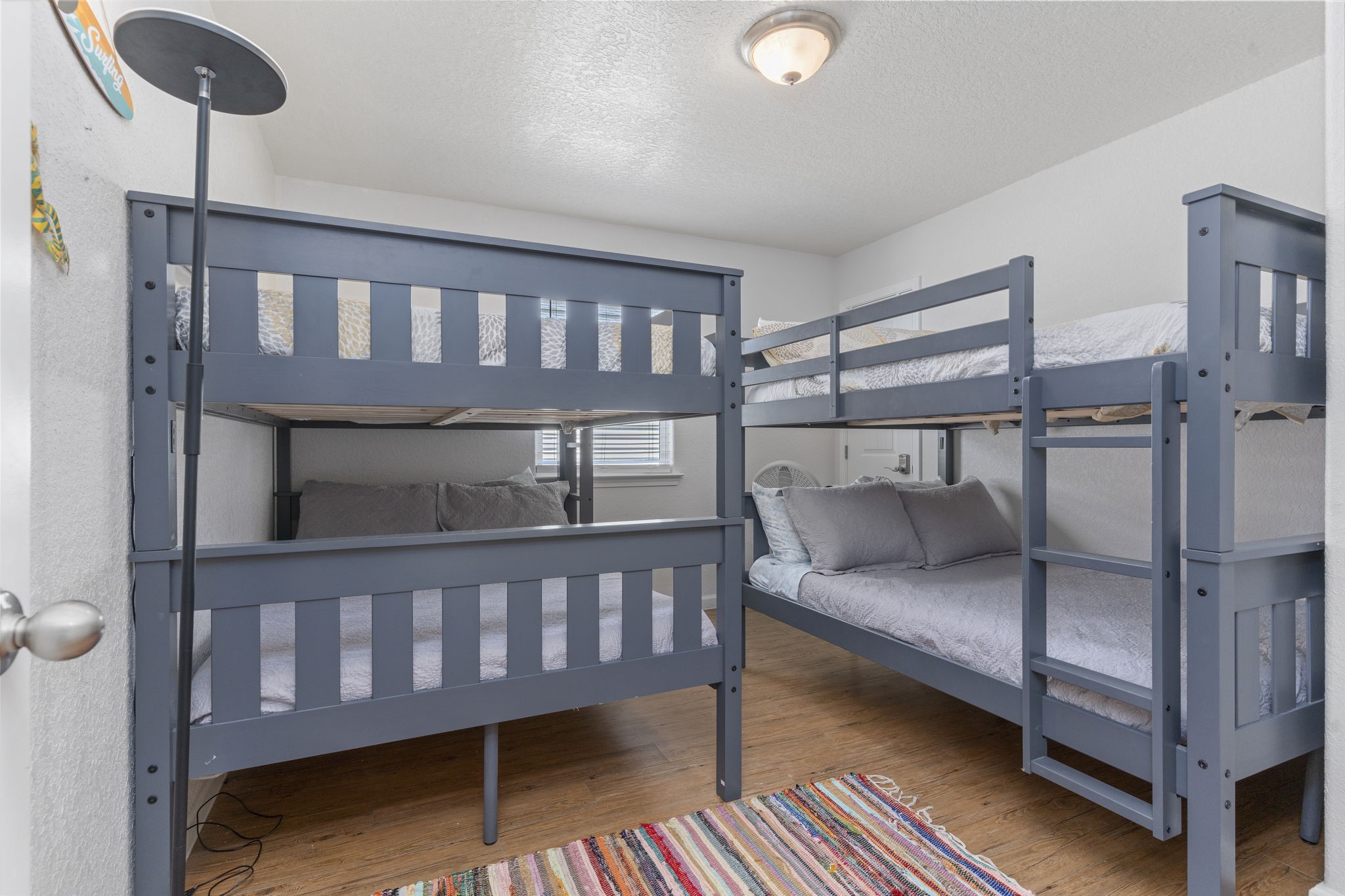 111 Howard Avenue Surfside Beach, TX 77541 - Photo 28 of 33 a bedroom with furniture and a window