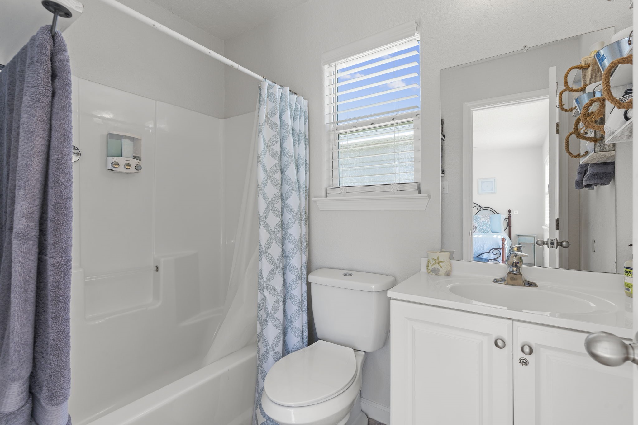 111 Howard Avenue Surfside Beach, TX 77541 - Photo 31 of 33 a bathroom with a sink toilet and shower