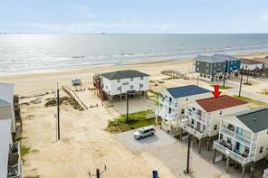 111 Howard Avenue Surfside Beach, TX 77541 - Photo 4 of 33 a view of a swimming pool with an ocean view