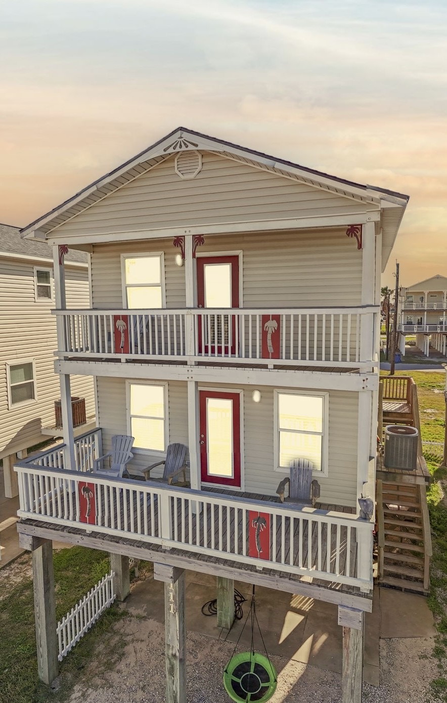 111 Howard Avenue Surfside Beach, TX 77541 - Photo 5 of 33 front view of a house with a door