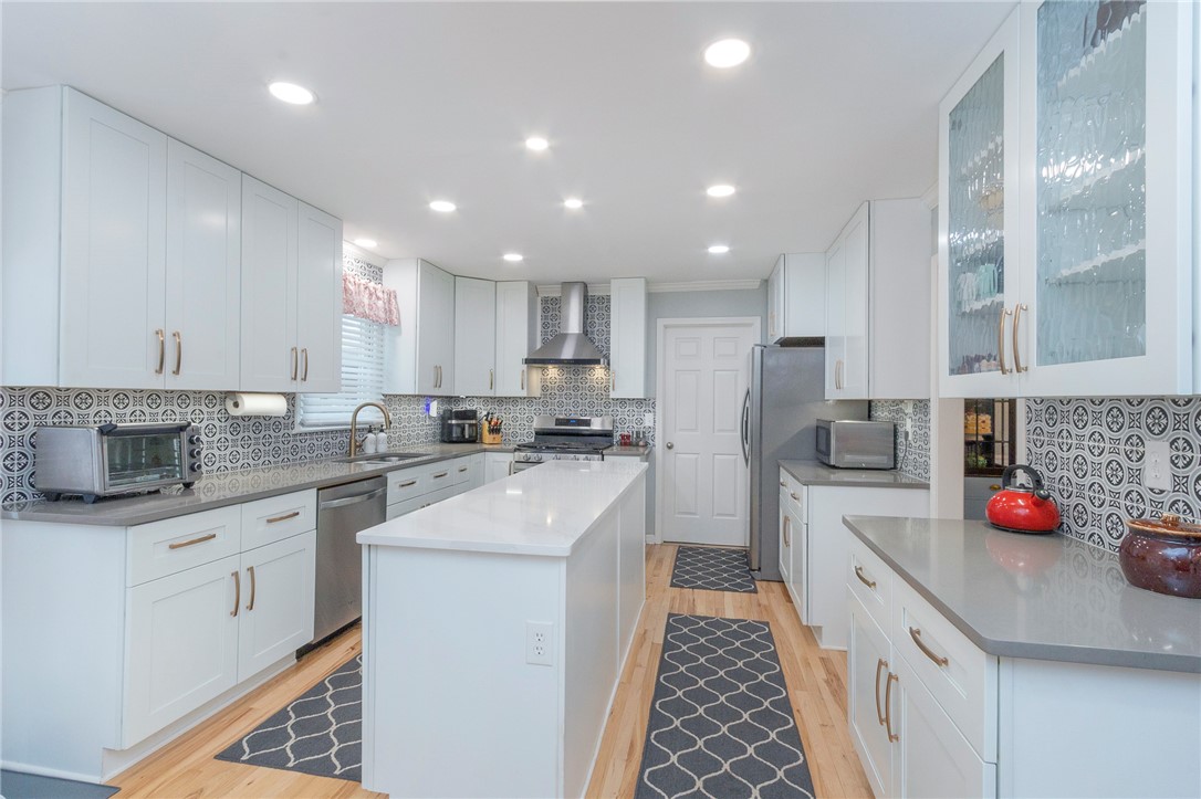 203 Oak Hollow Pendleton, SC 29670 - Photo 8 of 50 A pristine culinary space with white cabinetry and bright recessed lighting.