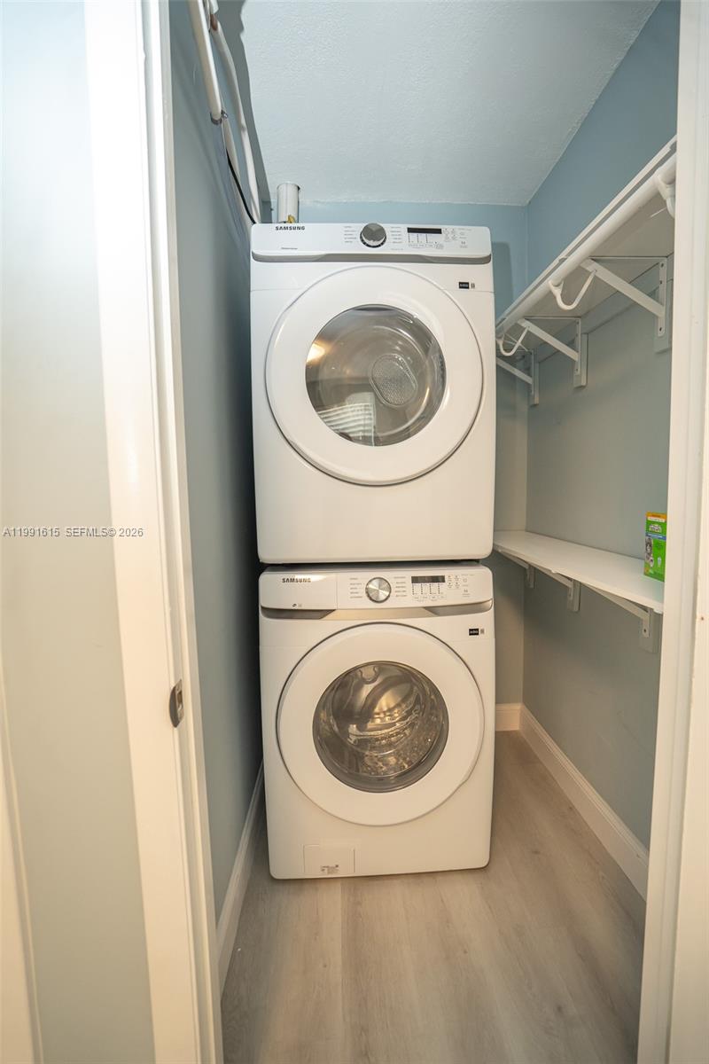 2230 Southwest 60th Court Miami, FL 33155 - Photo 24 of 35 a utility room with dryer and washer