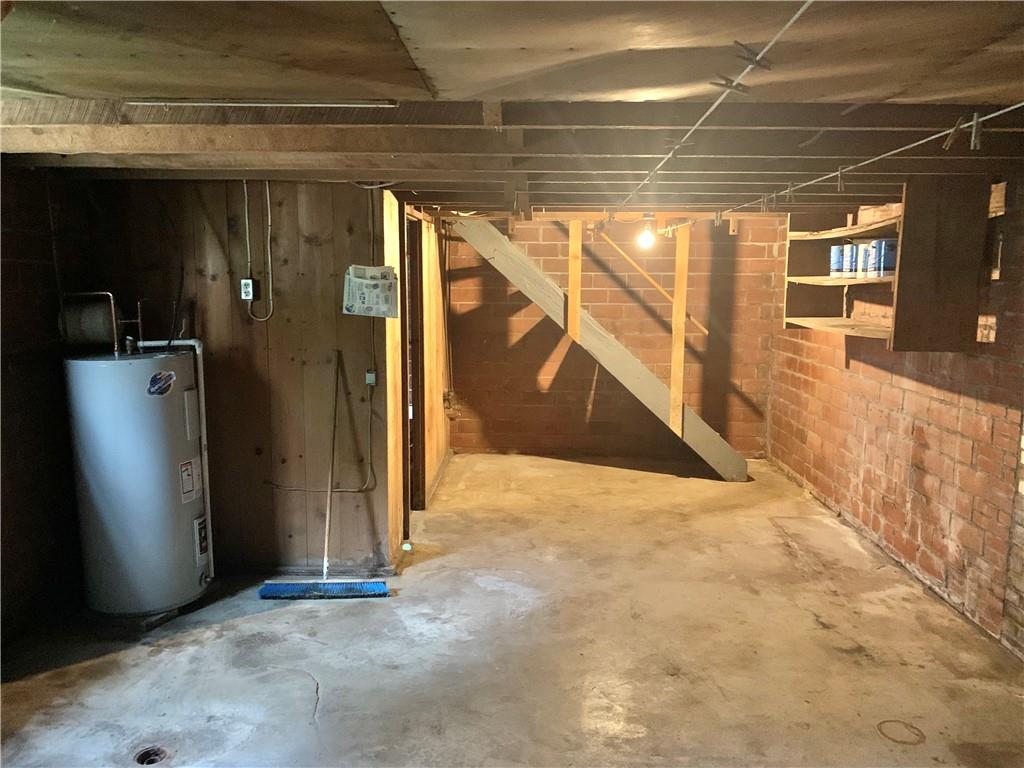 448 Ridge Church Road Amity, PA 15311 - Photo 15 of 24 a view of a hallway with wooden walls