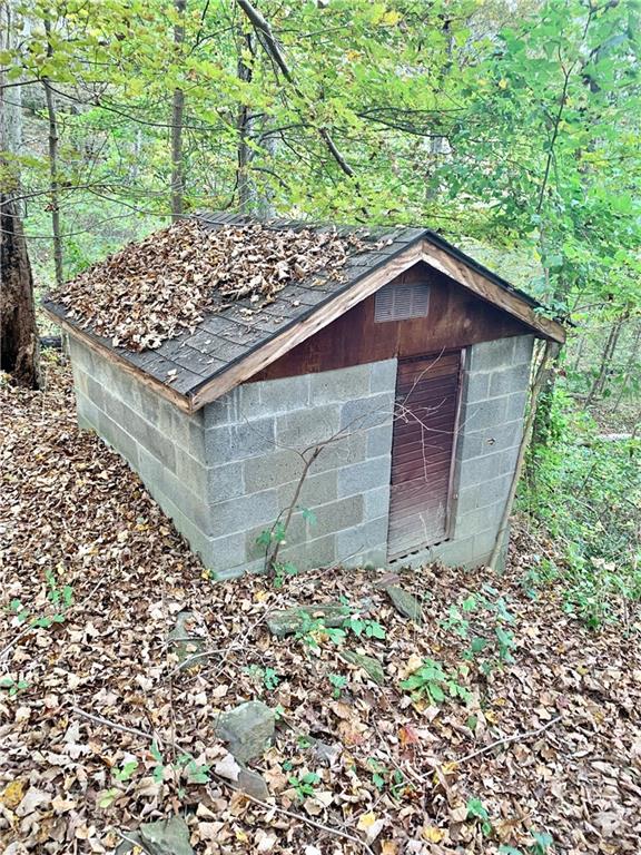 448 Ridge Church Road Amity, PA 15311 - Photo 20 of 24 a wooden bench with a small yard