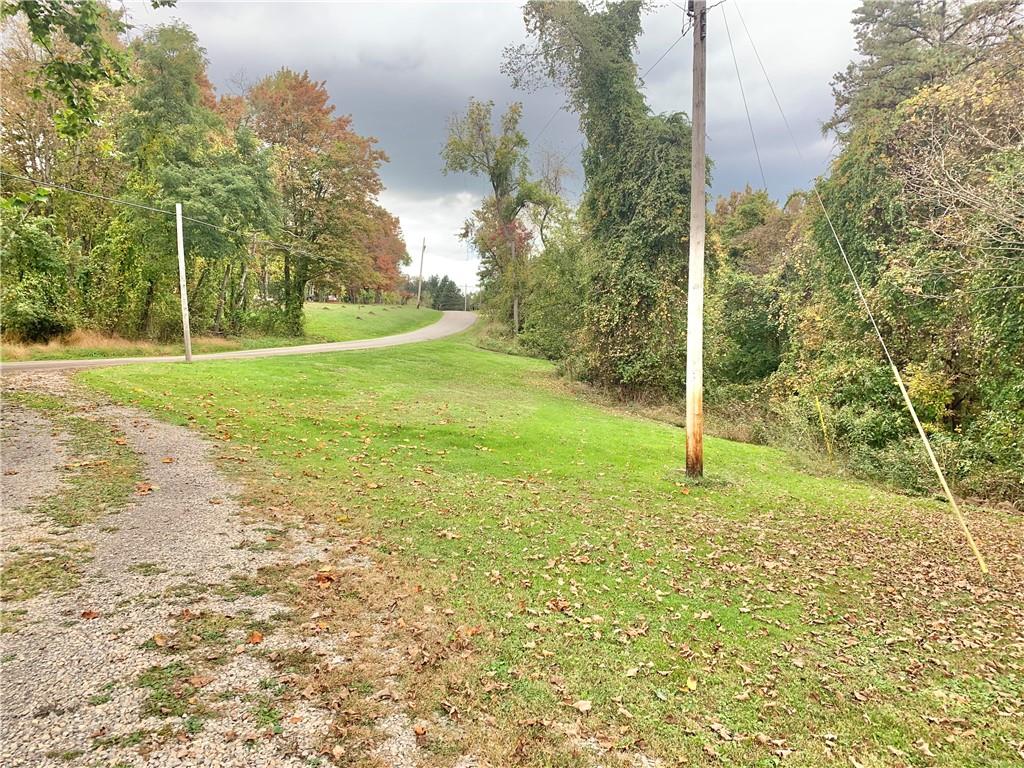 448 Ridge Church Road Amity, PA 15311 - Photo 22 of 24 a view of a yard with a tree