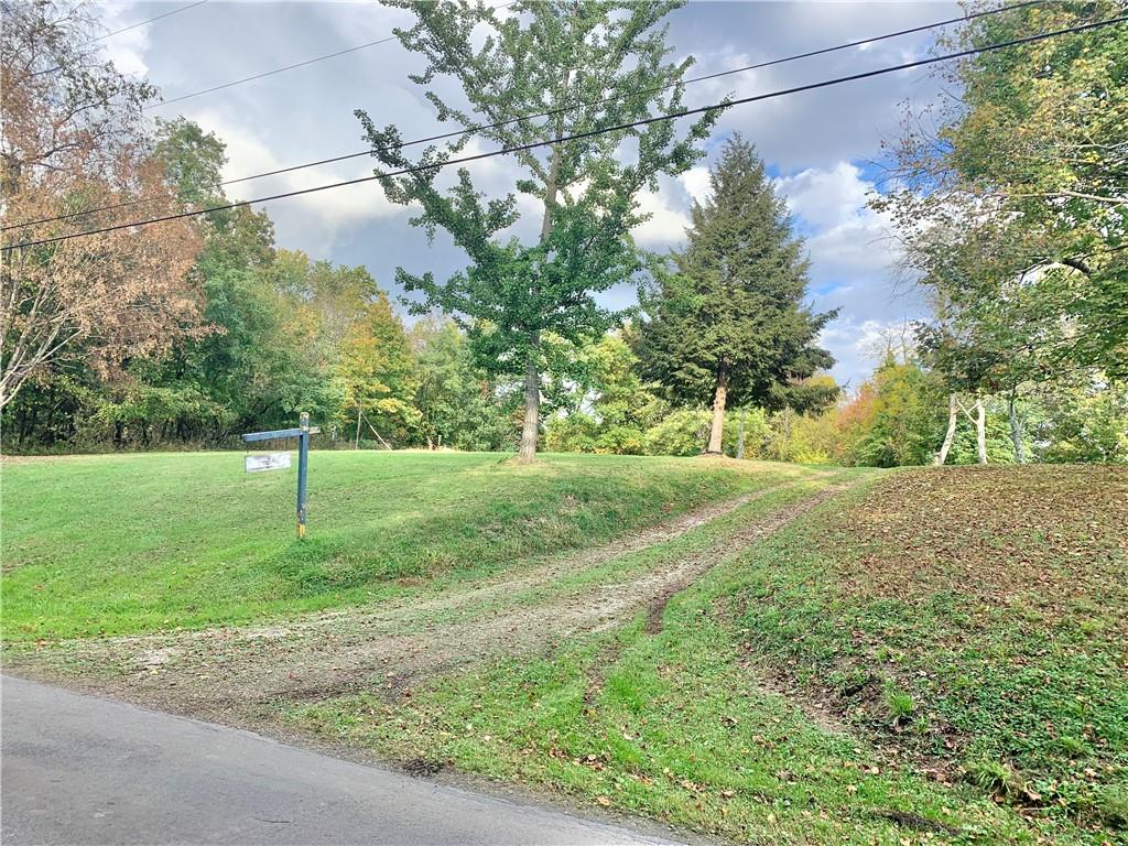 448 Ridge Church Road Amity, PA 15311 - Photo 23 of 24 a backyard of a house with lots of green space