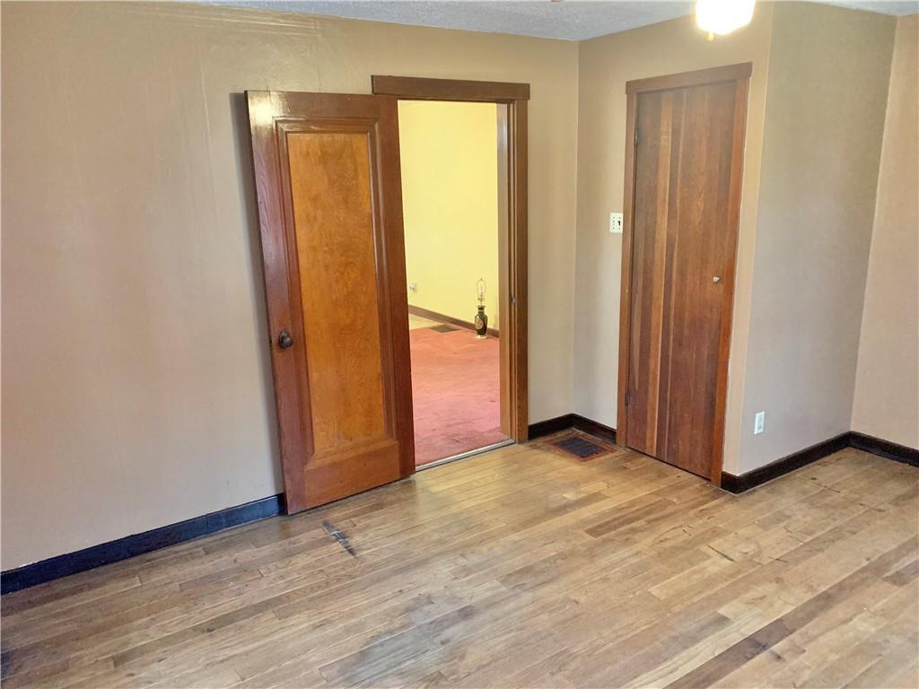 448 Ridge Church Road Amity, PA 15311 - Photo 7 of 24 a view of an empty room with closet and a window