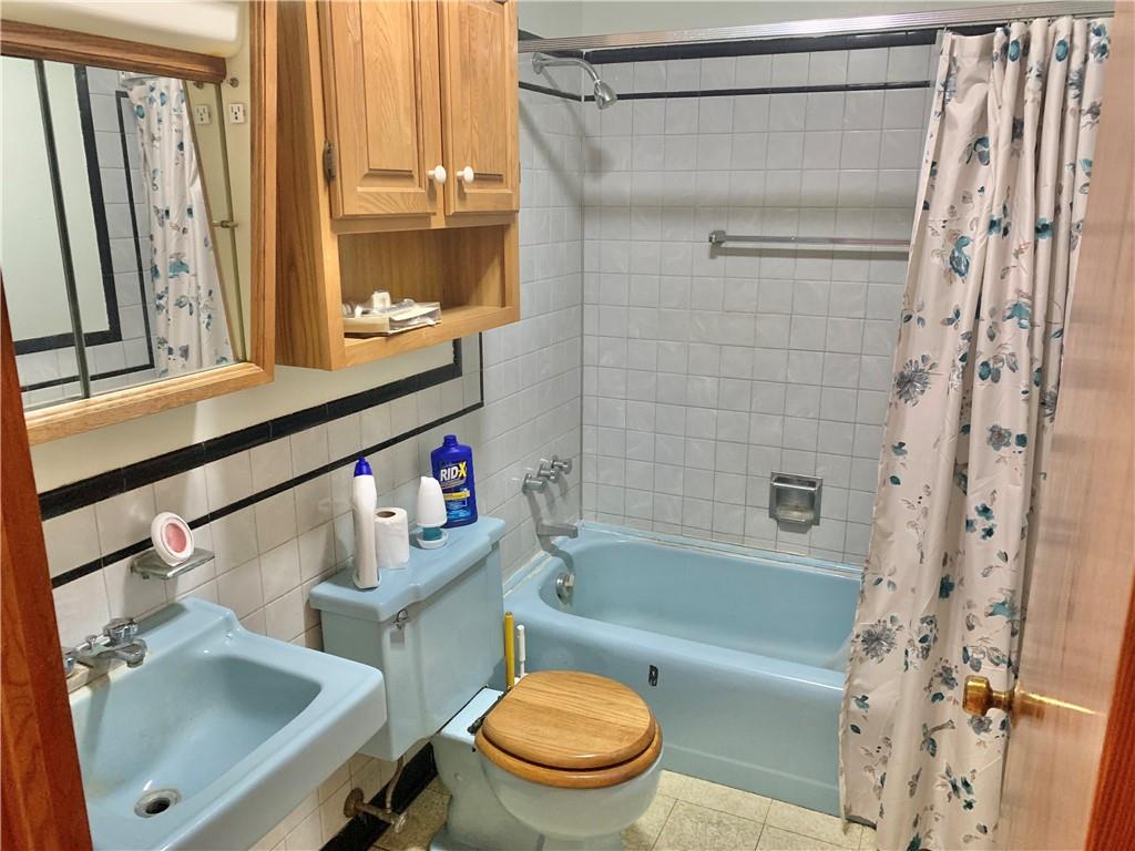 448 Ridge Church Road Amity, PA 15311 - Photo 9 of 24 a bathroom with a sink a toilet and a bathtub