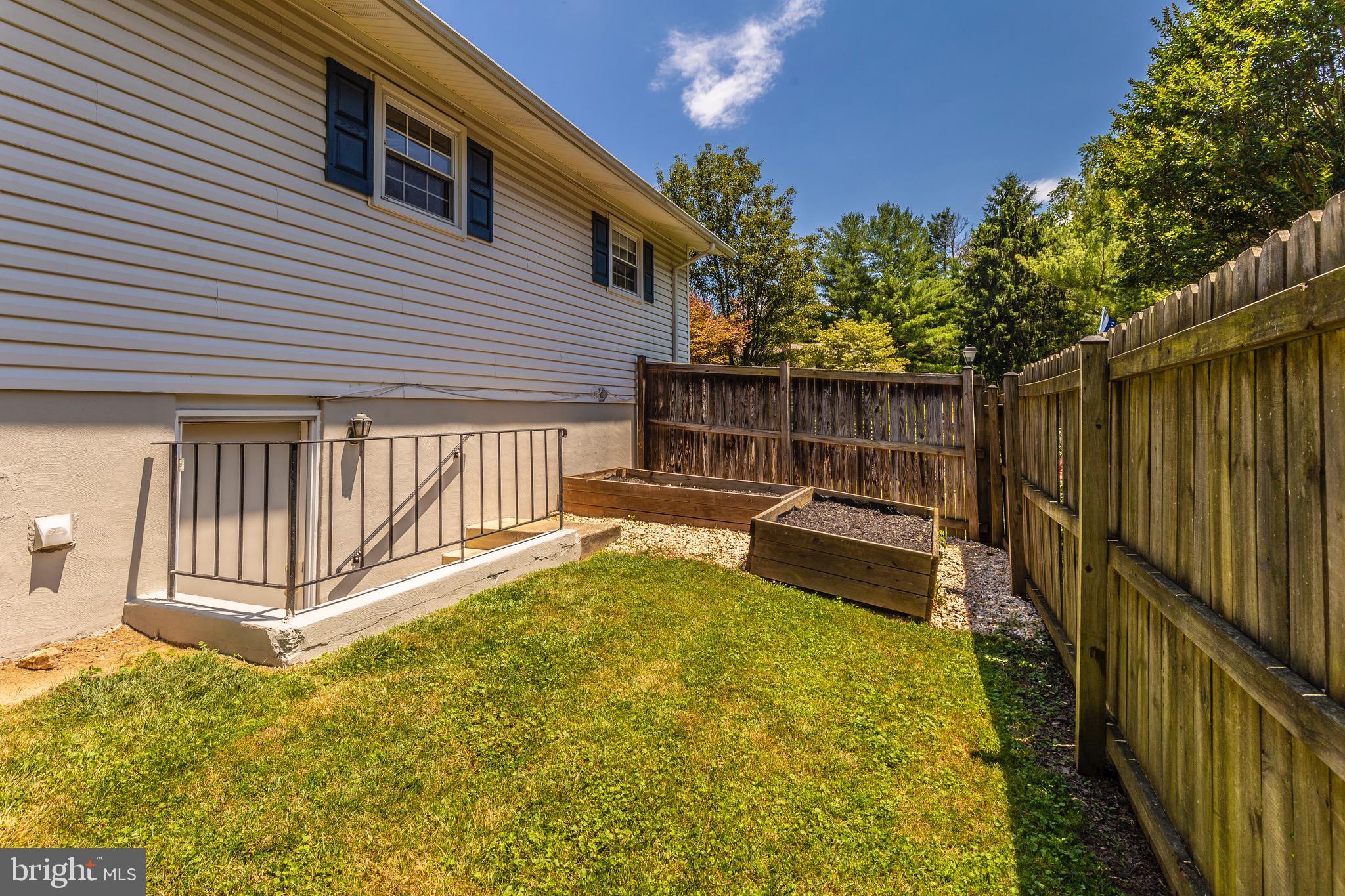 24008 Log House Road Gaithersburg, MD 20882 - Photo 50 of 58 Side yard with raised garden beds