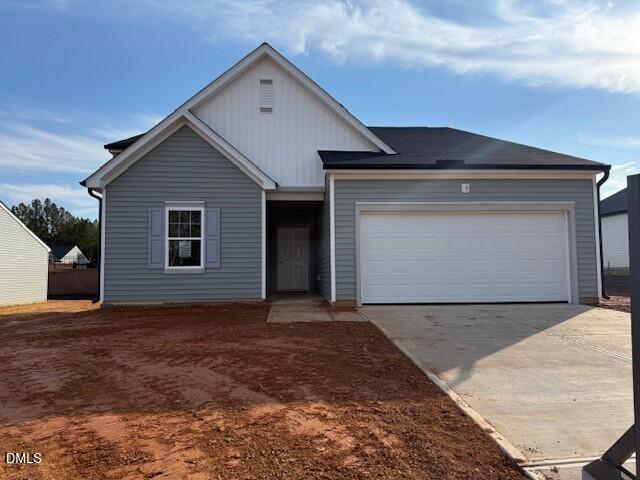 a view of front door and yard