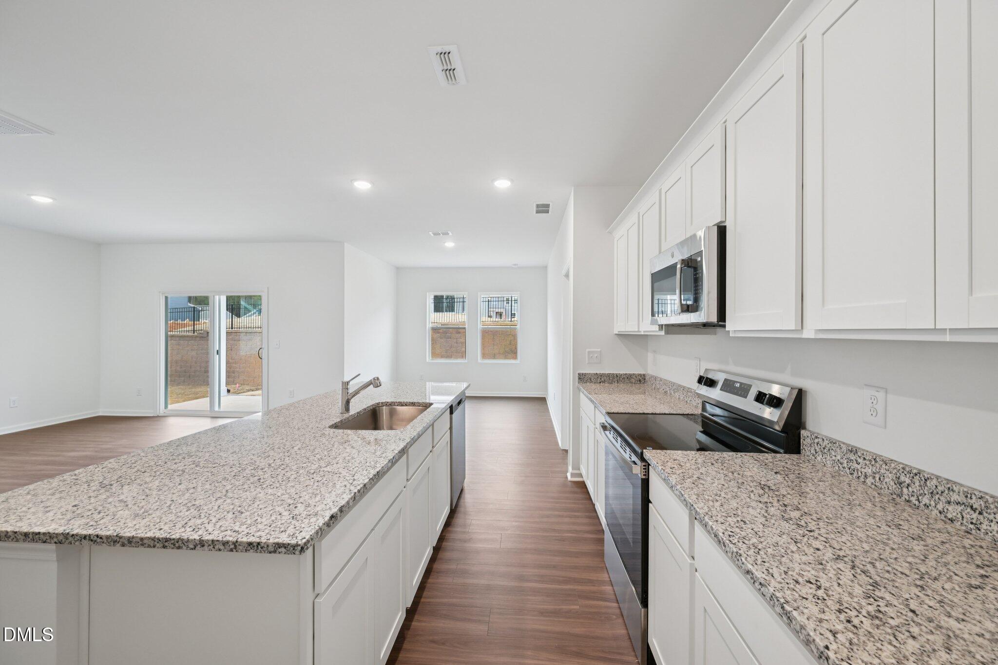 11210 Salers Loop Middlesex, NC 27557 - Photo 16 of 53 a kitchen with granite countertop lots of counter top space