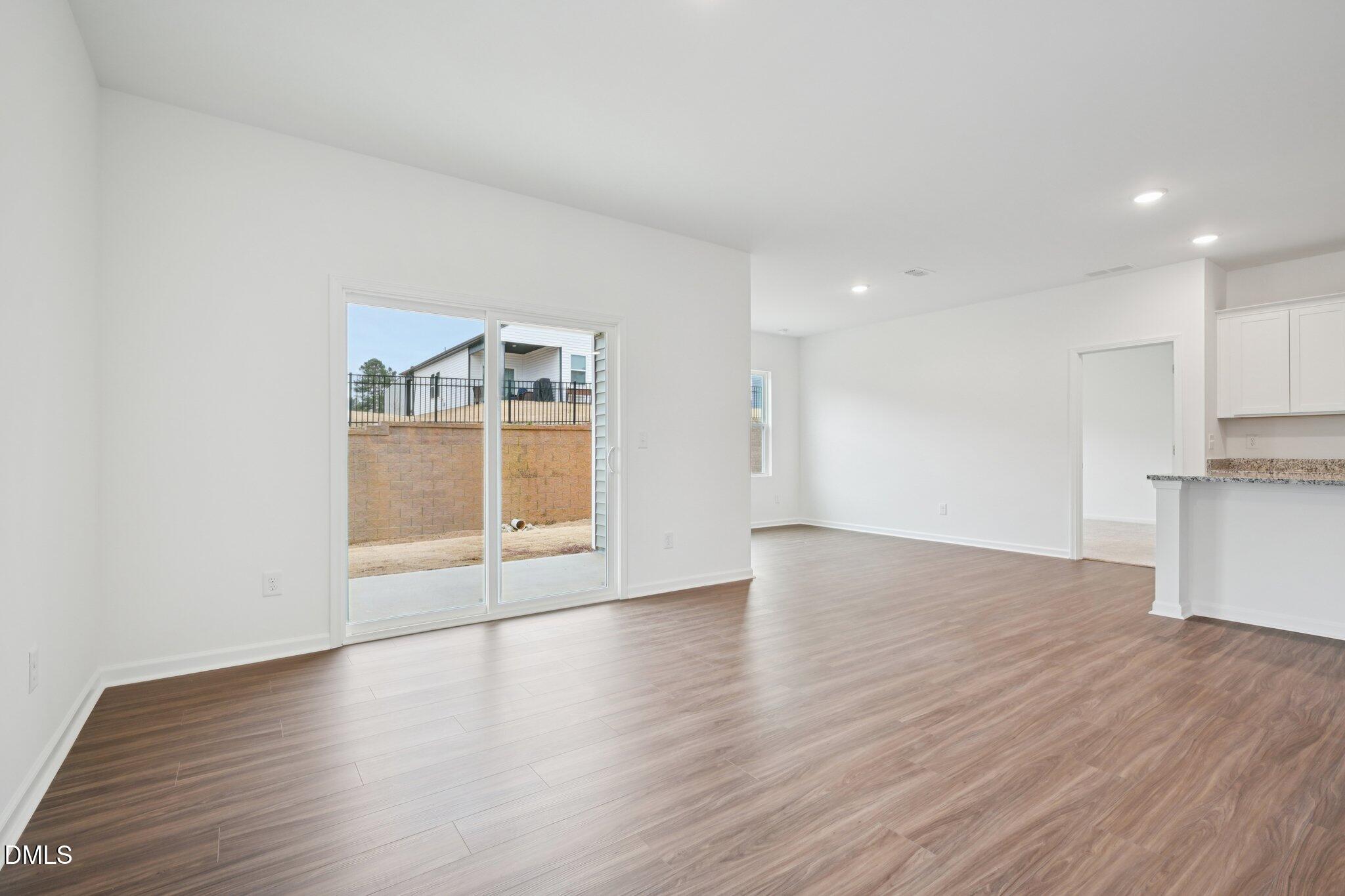 11210 Salers Loop Middlesex, NC 27557 - Photo 26 of 53 a view of a livingroom with wooden floor
