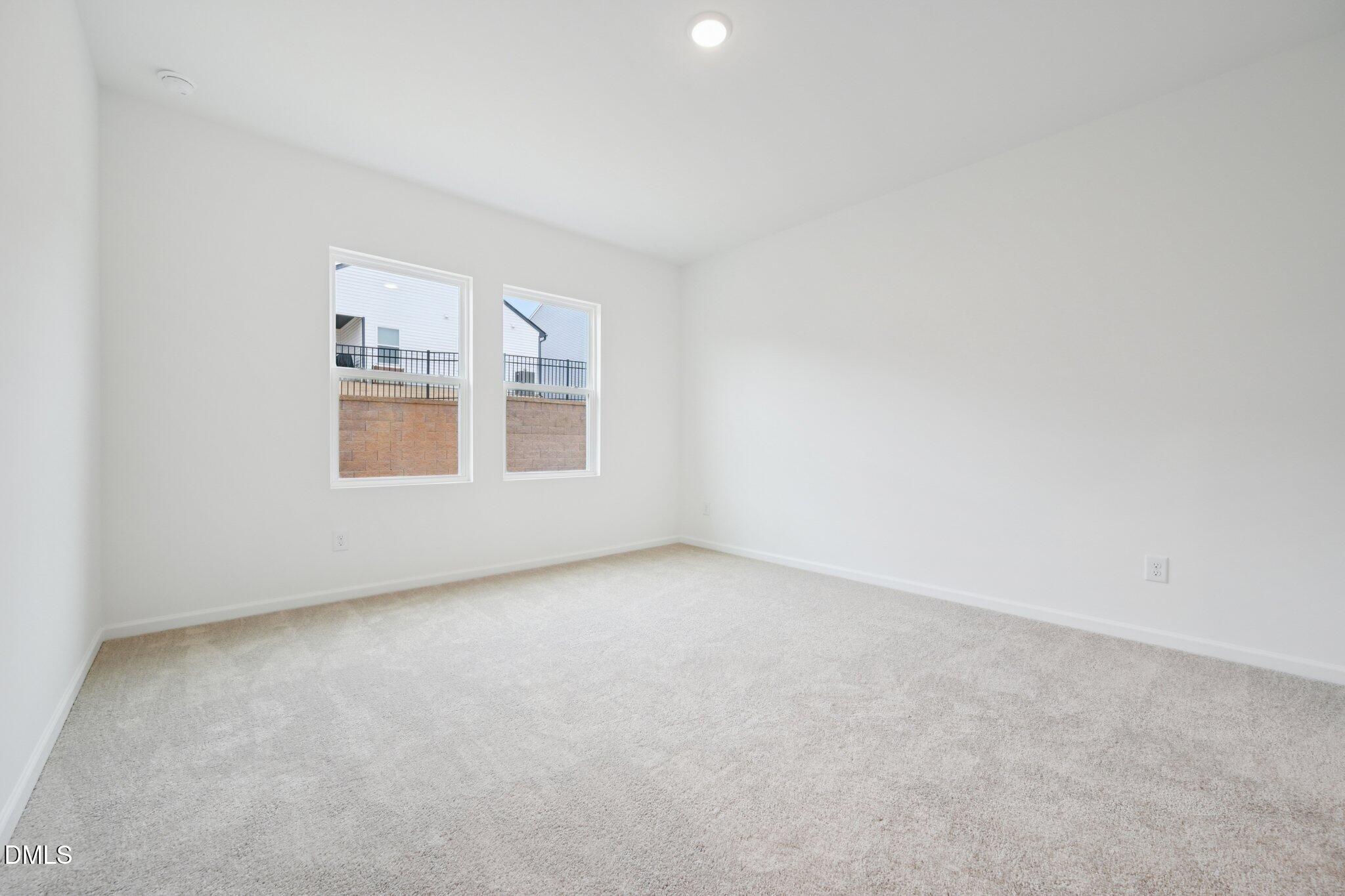 11210 Salers Loop Middlesex, NC 27557 - Photo 28 of 53 an empty room with windows