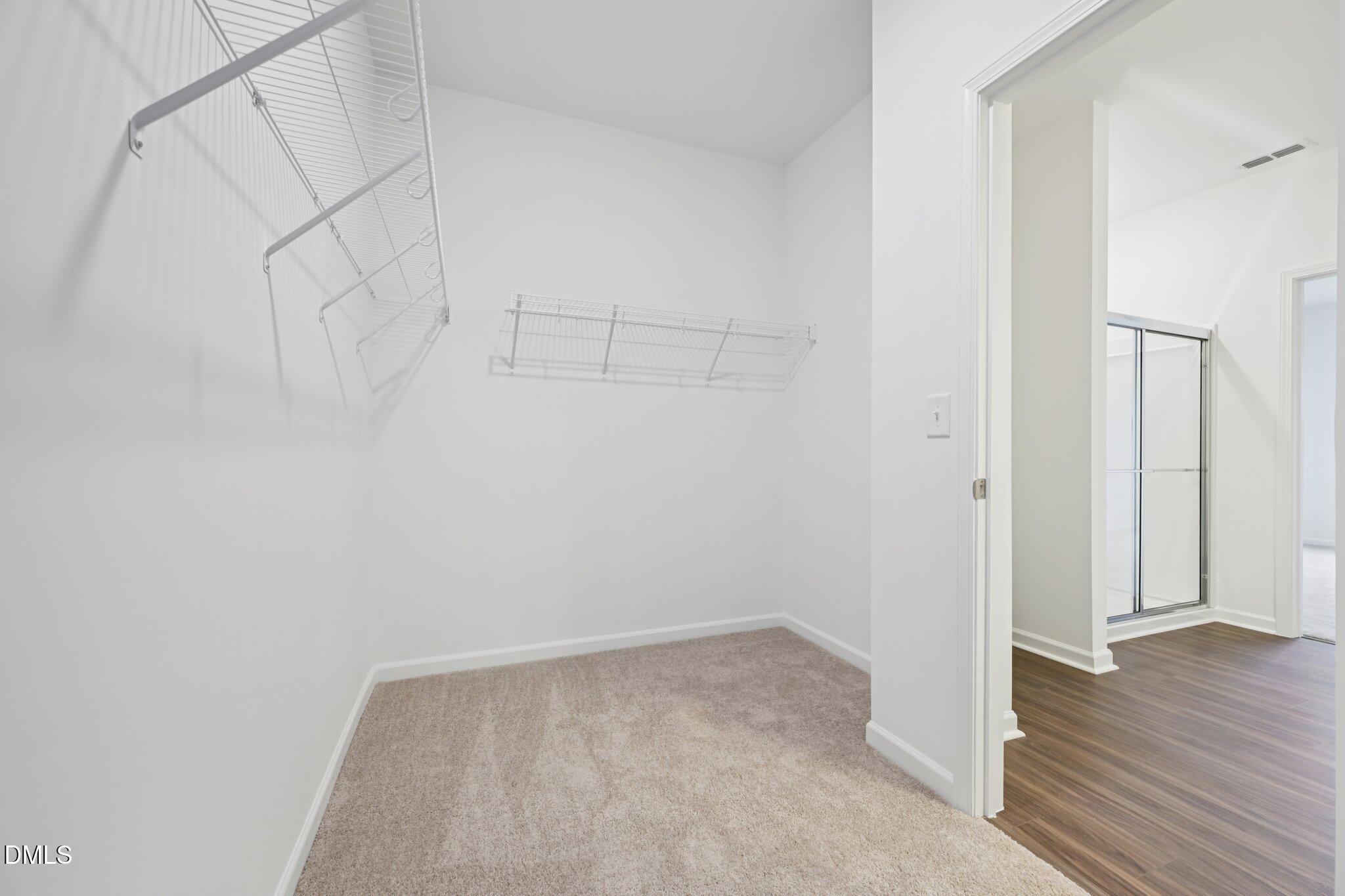 11210 Salers Loop Middlesex, NC 27557 - Photo 33 of 53 a view of a room with wooden floor
