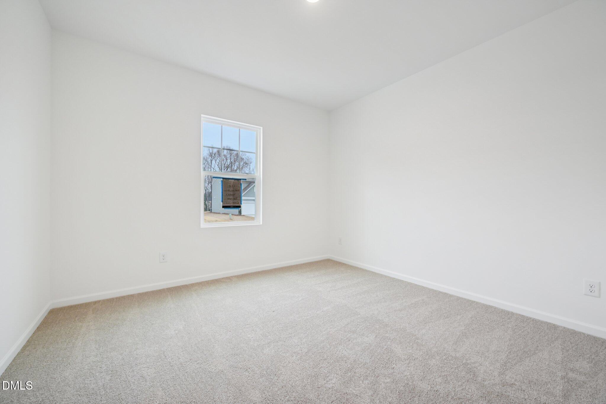 11210 Salers Loop Middlesex, NC 27557 - Photo 9 of 53 a view of an empty room with a window