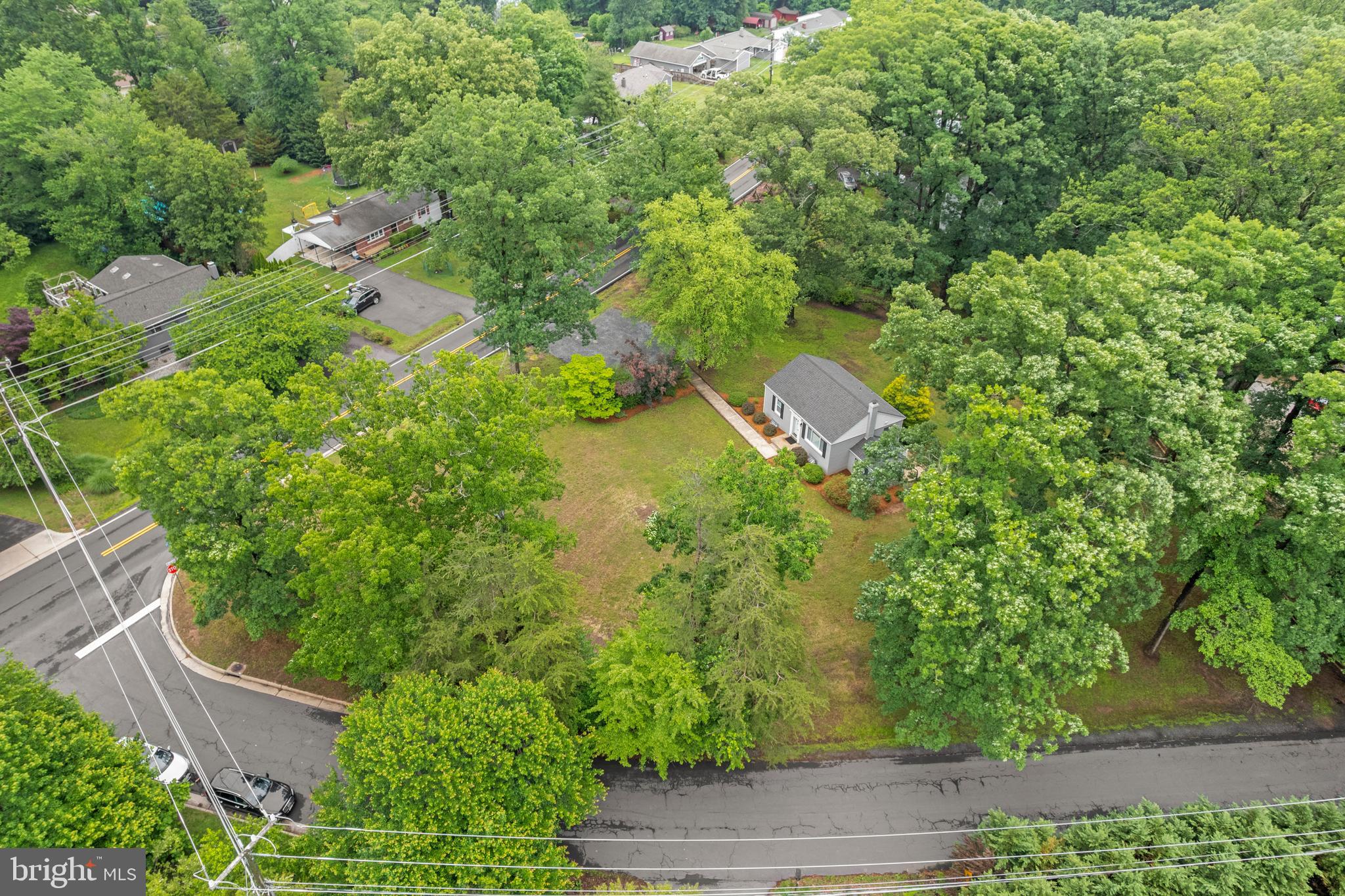 12131 Waples Mill Road Oakton, VA 22124 - Photo 36 of 40 an aerial view of residential house with outdoor space and trees all around