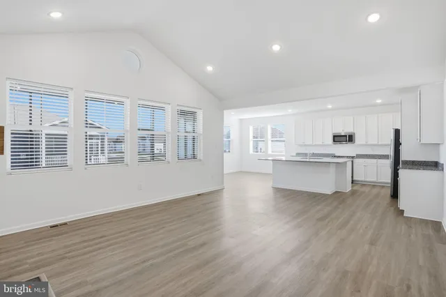 a view of kitchen with wooden floor