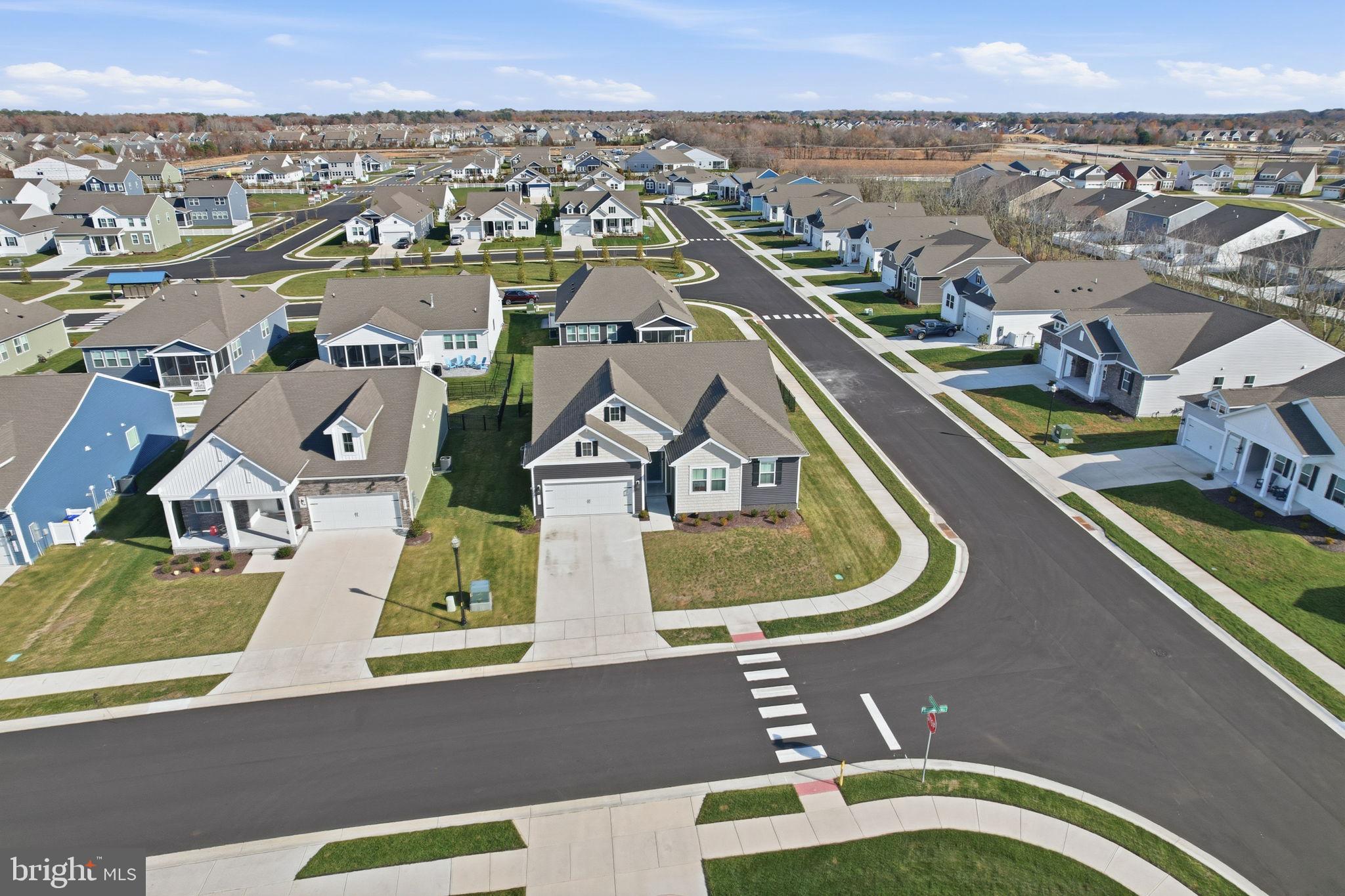 23402 Buttonbush Way Millville, DE 19967 - Photo 4 of 52 an aerial view of a house with a ocean view