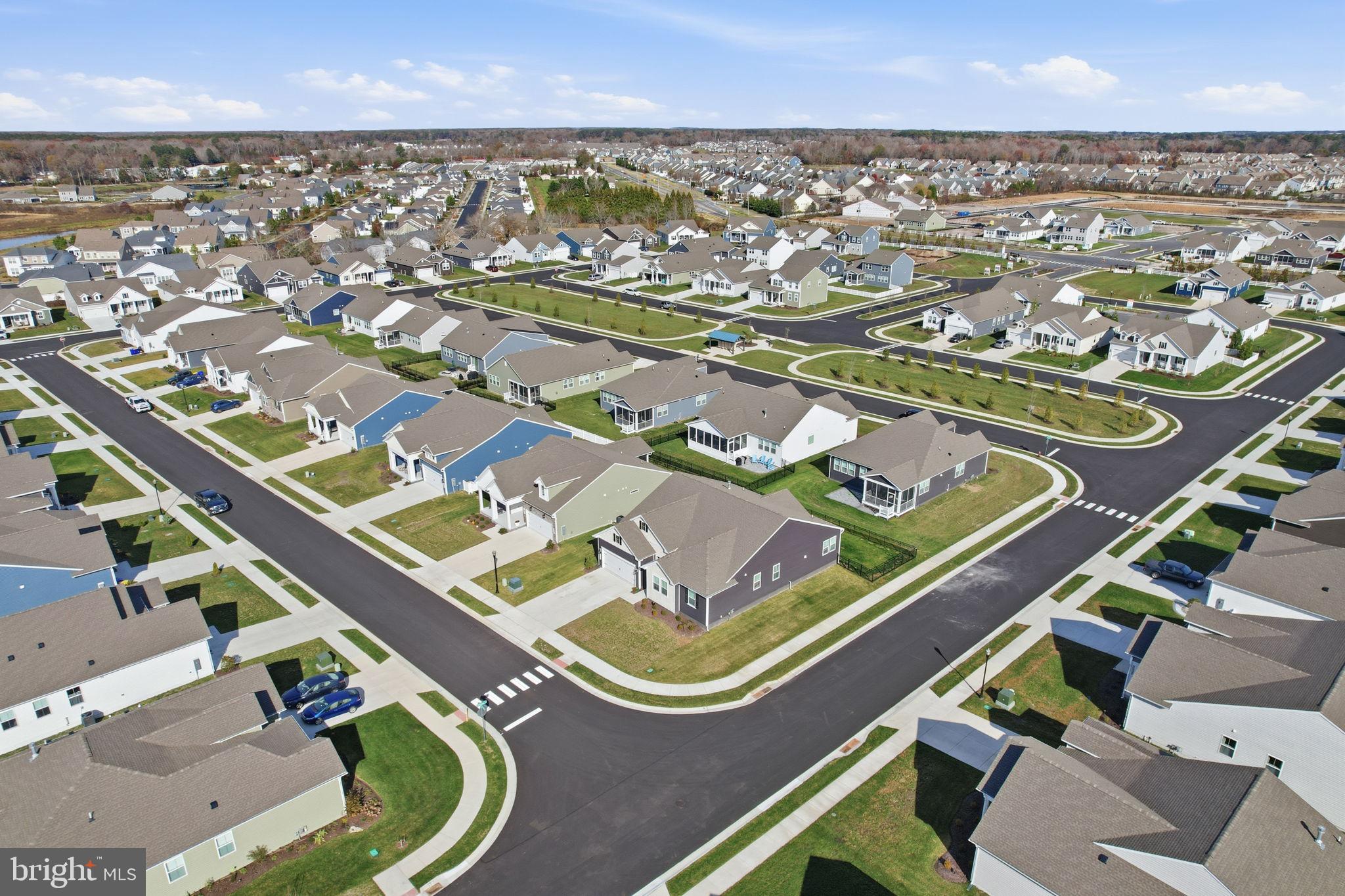 23402 Buttonbush Way Millville, DE 19967 - Photo 7 of 52 an aerial view of a city