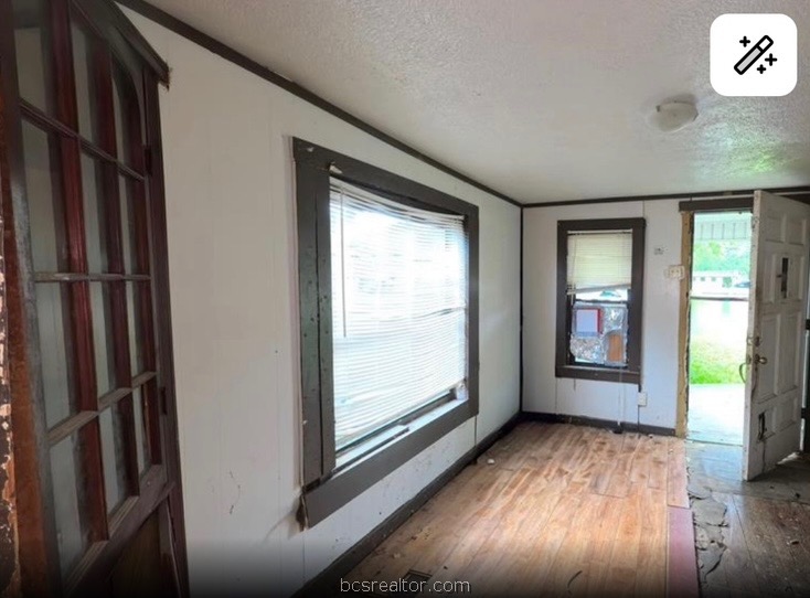 1203 Boulevard Street Bryan, TX 77803 - Photo 10 of 16 a view of empty room with floor to ceiling window