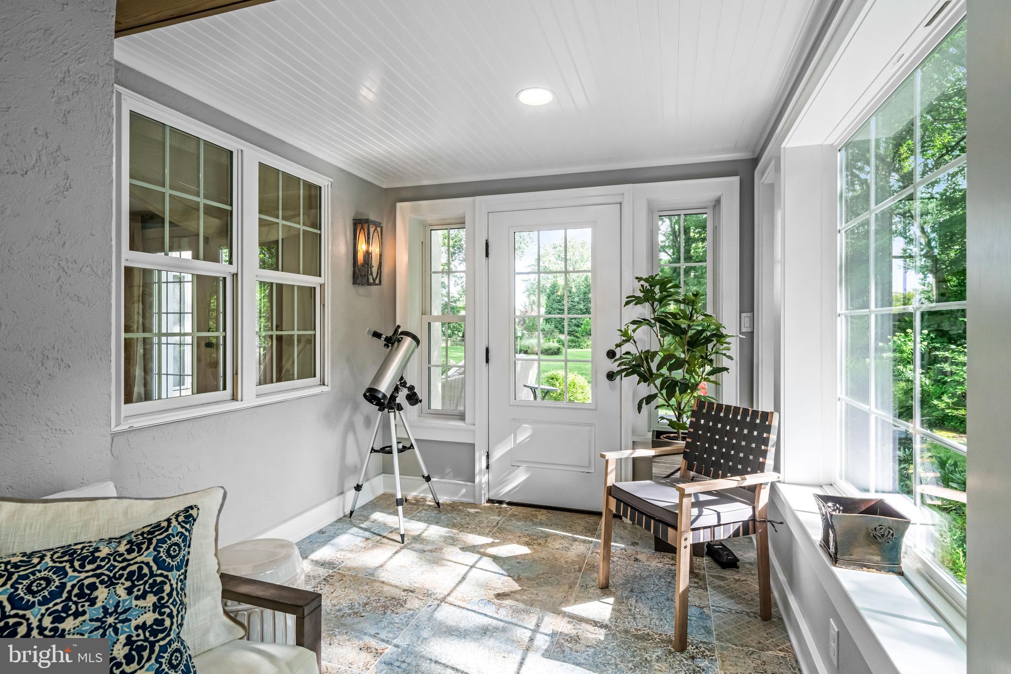 113 Deepdale Road Wayne, PA 19087 - Photo 11 of 68 a living room filled with furniture and a potted plant