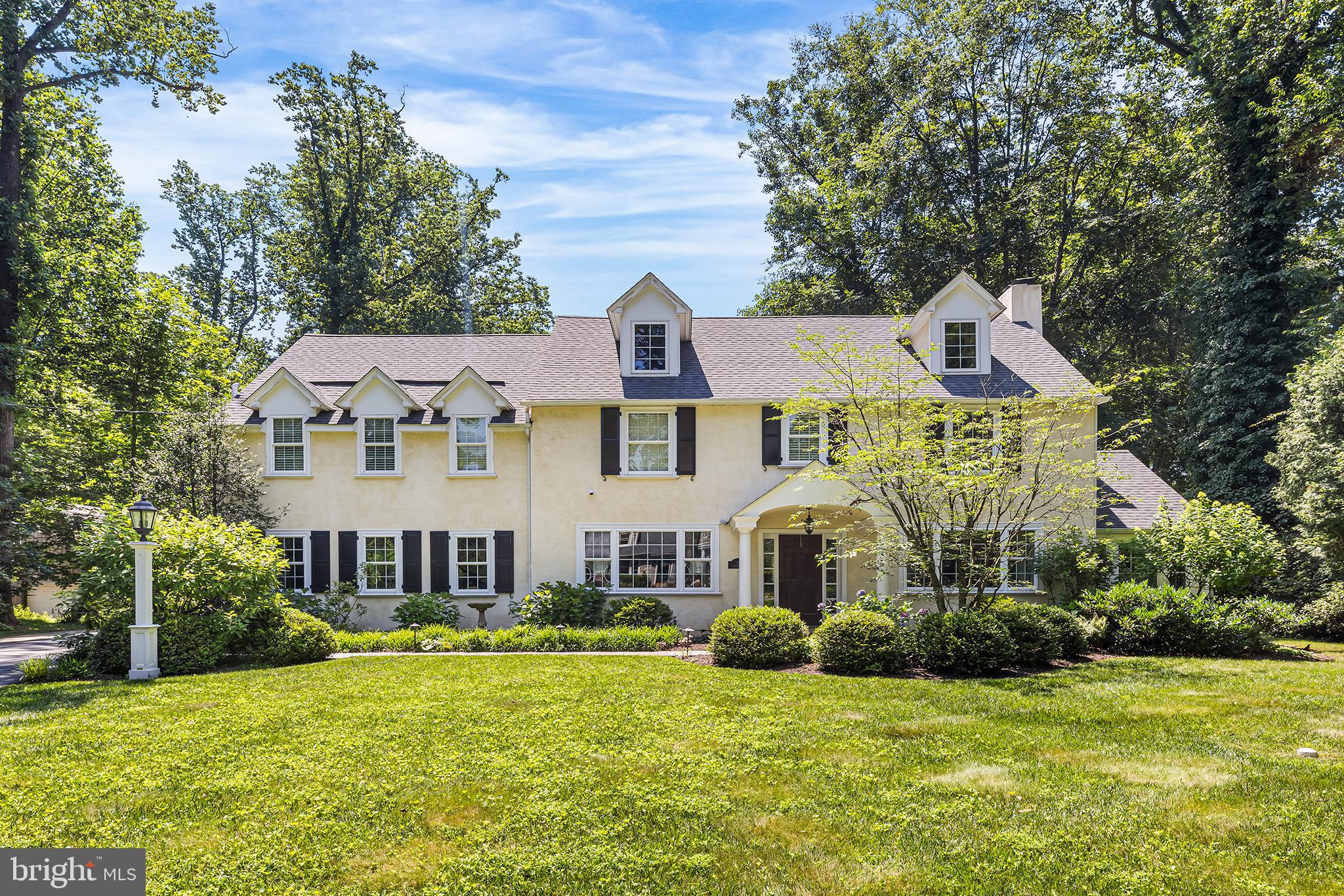 113 Deepdale Road Wayne, PA 19087 - Photo 2 of 68 a view of a house with a big yard and large trees