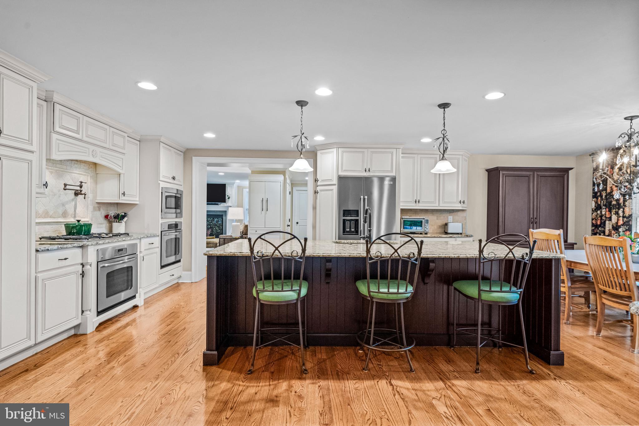 113 Deepdale Road Wayne, PA 19087 - Photo 21 of 68 a large kitchen with a table and chairs