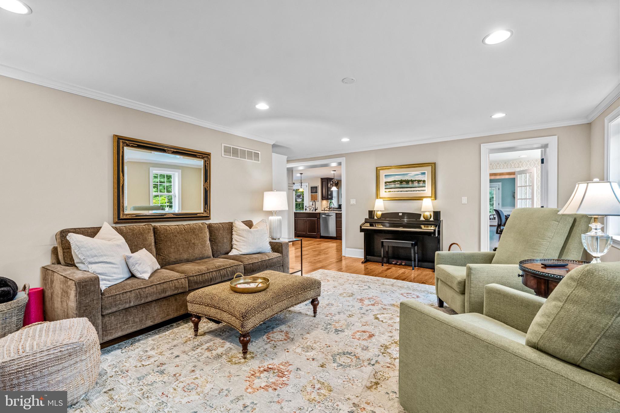 113 Deepdale Road Wayne, PA 19087 - Photo 27 of 68 a living room with furniture flat screen tv and couches