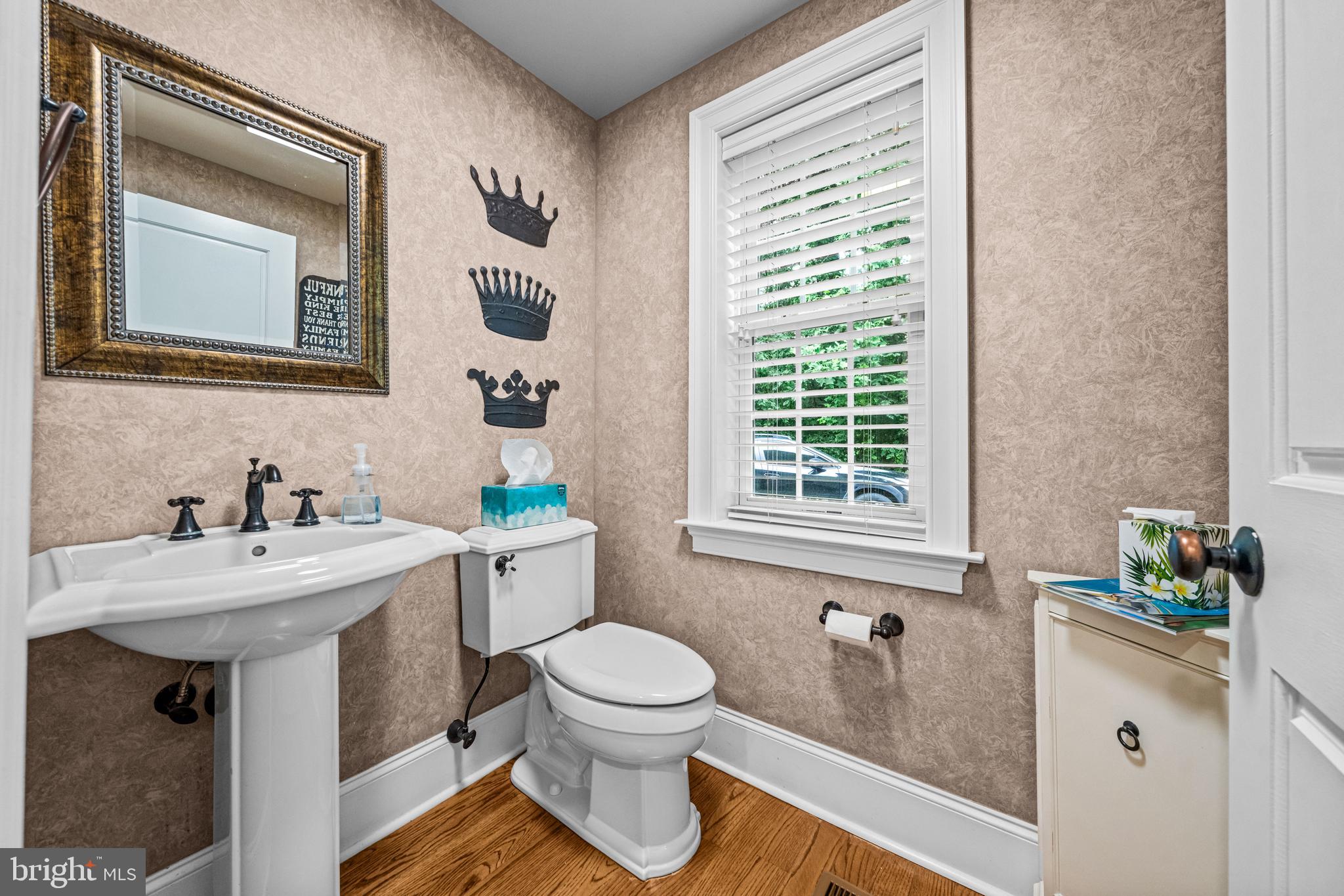 113 Deepdale Road Wayne, PA 19087 - Photo 29 of 68 a bathroom with a sink mirror toilet and next to a window