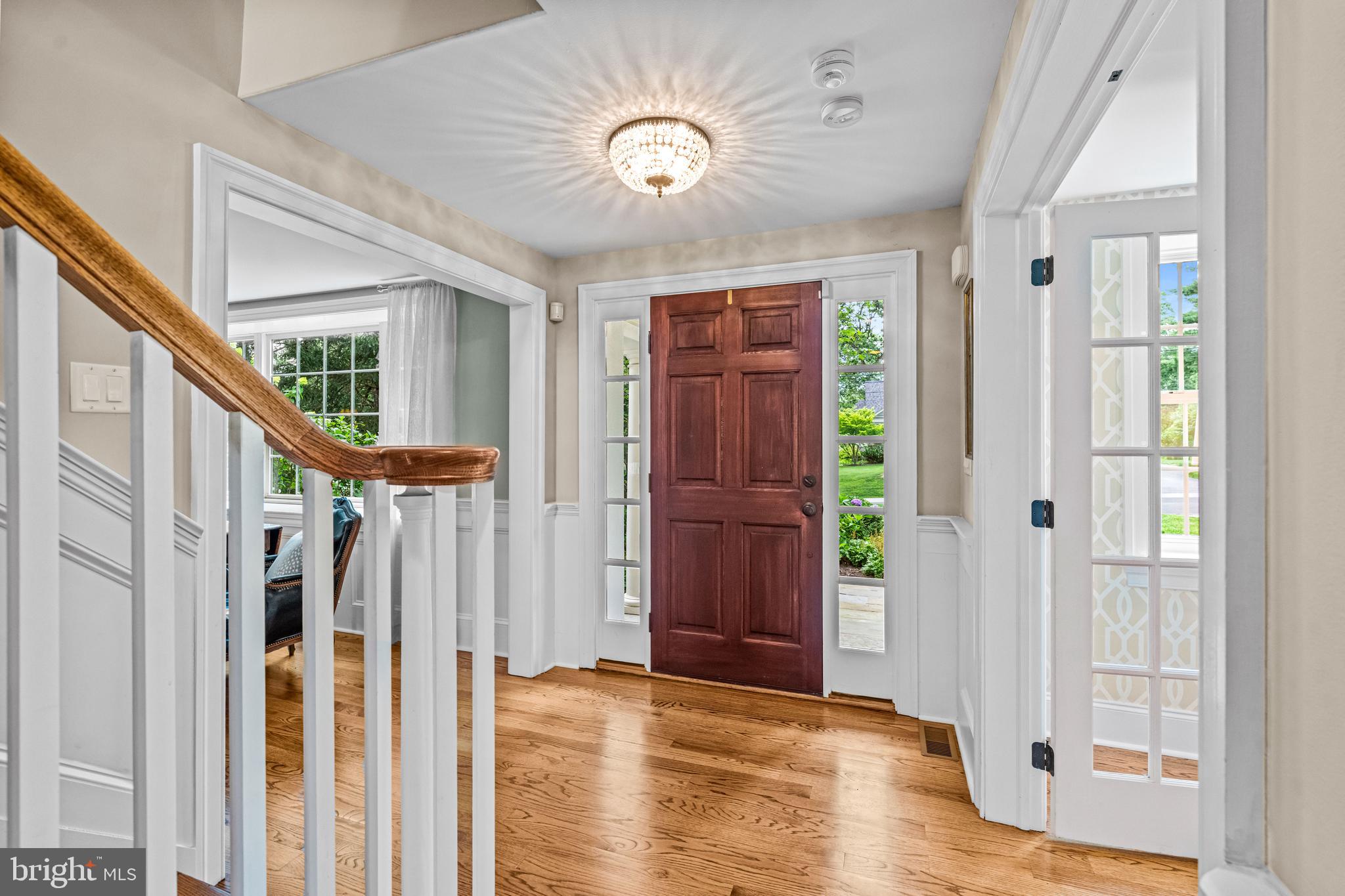 113 Deepdale Road Wayne, PA 19087 - Photo 4 of 68 a view of an entryway with wooden floor and door