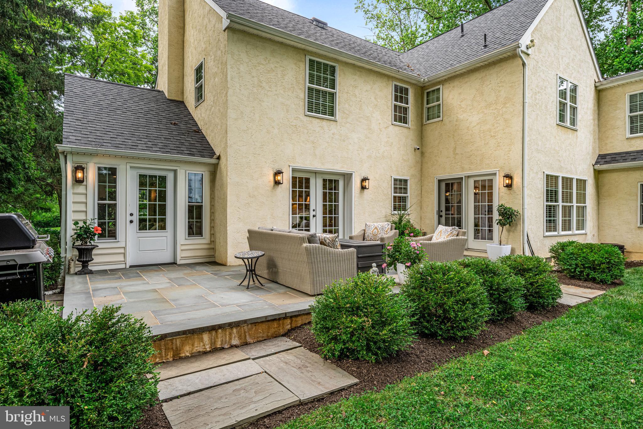 113 Deepdale Road Wayne, PA 19087 - Photo 59 of 68 a view of a house with backyard sitting area and garden