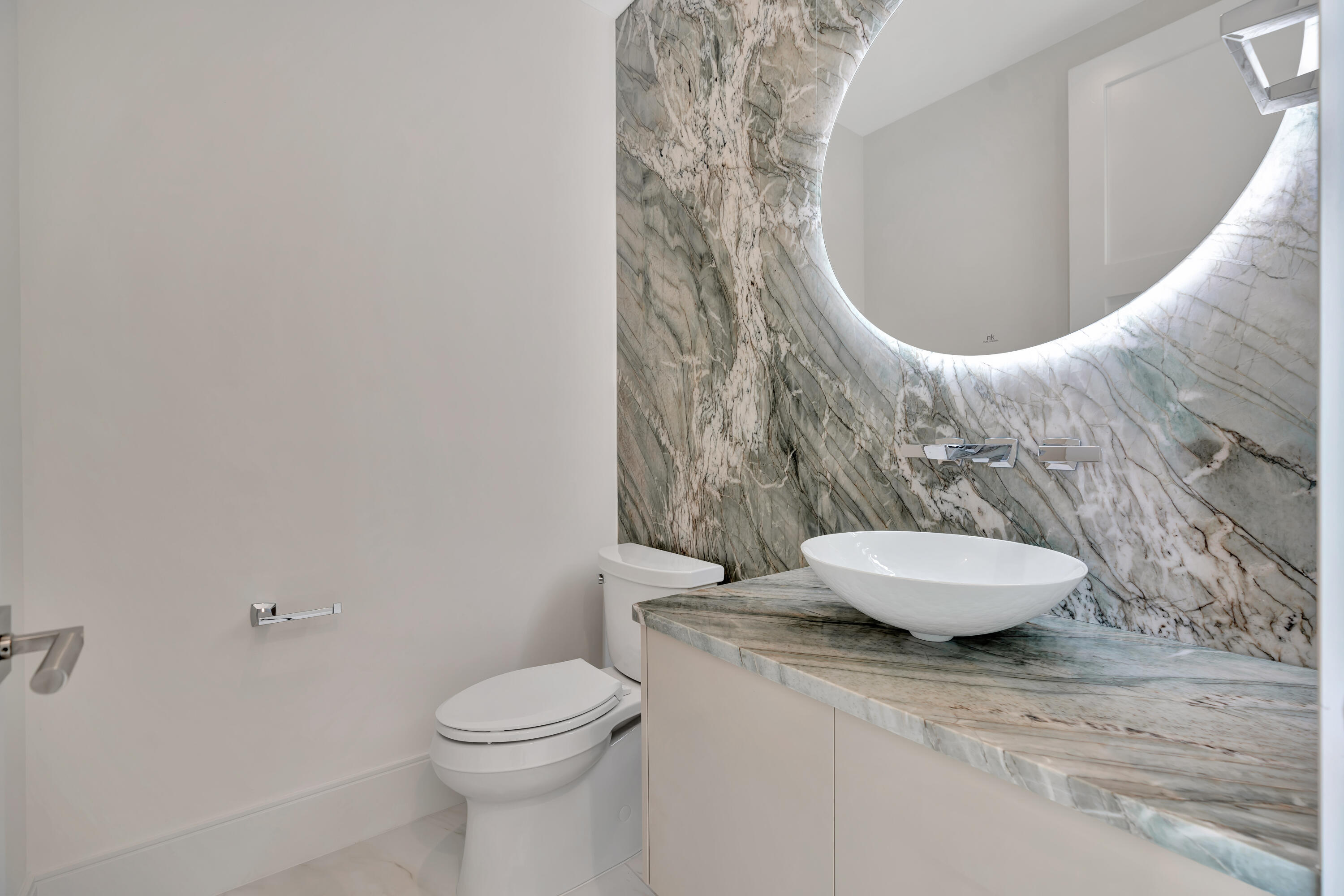 461 Venus Drive, Unit B Juno Beach, FL 33408 - Photo 28 of 85 a bathroom with a granite countertop sink and a mirror