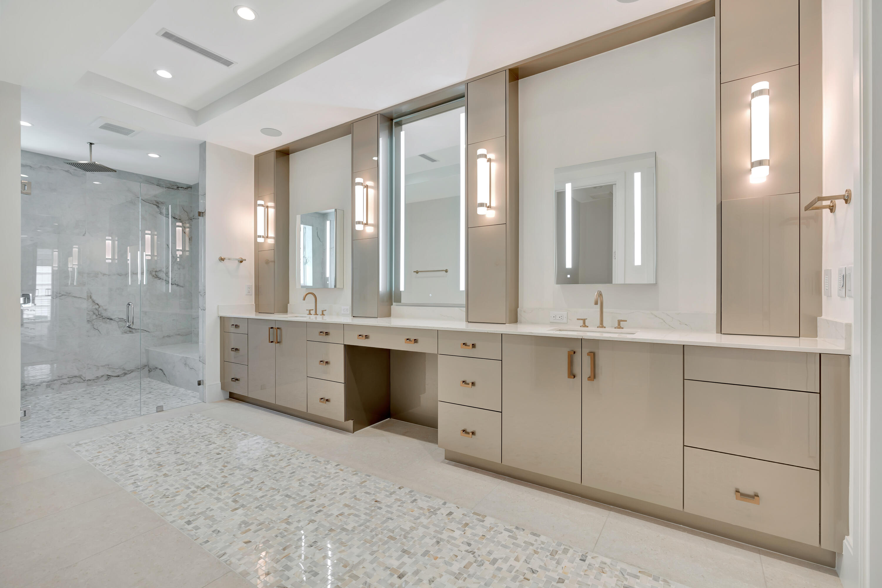 461 Venus Drive, Unit B Juno Beach, FL 33408 - Photo 47 of 85 a bathroom with a double vanity sink mirror and shower
