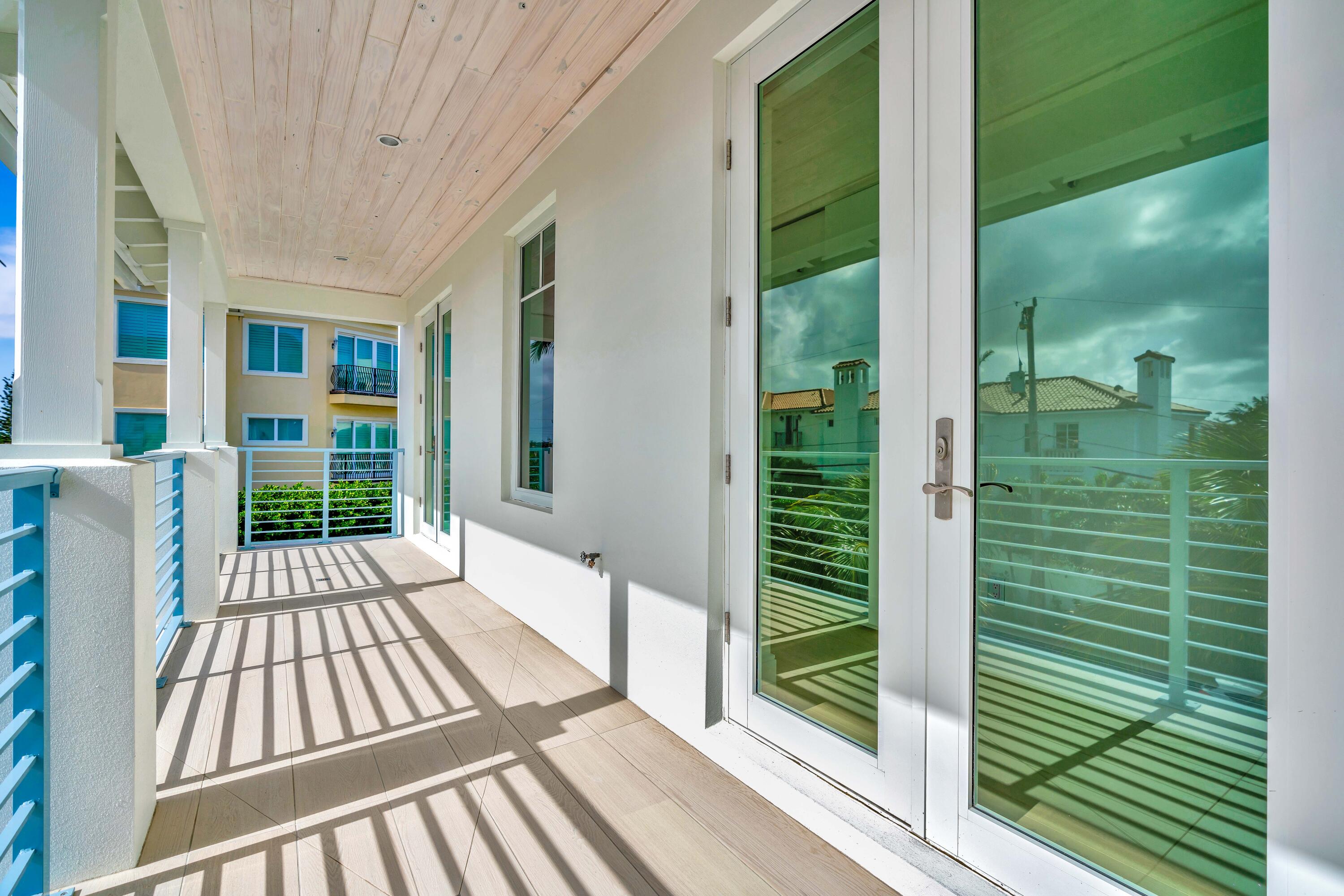 461 Venus Drive, Unit B Juno Beach, FL 33408 - Photo 64 of 85 a view of balcony with a garden
