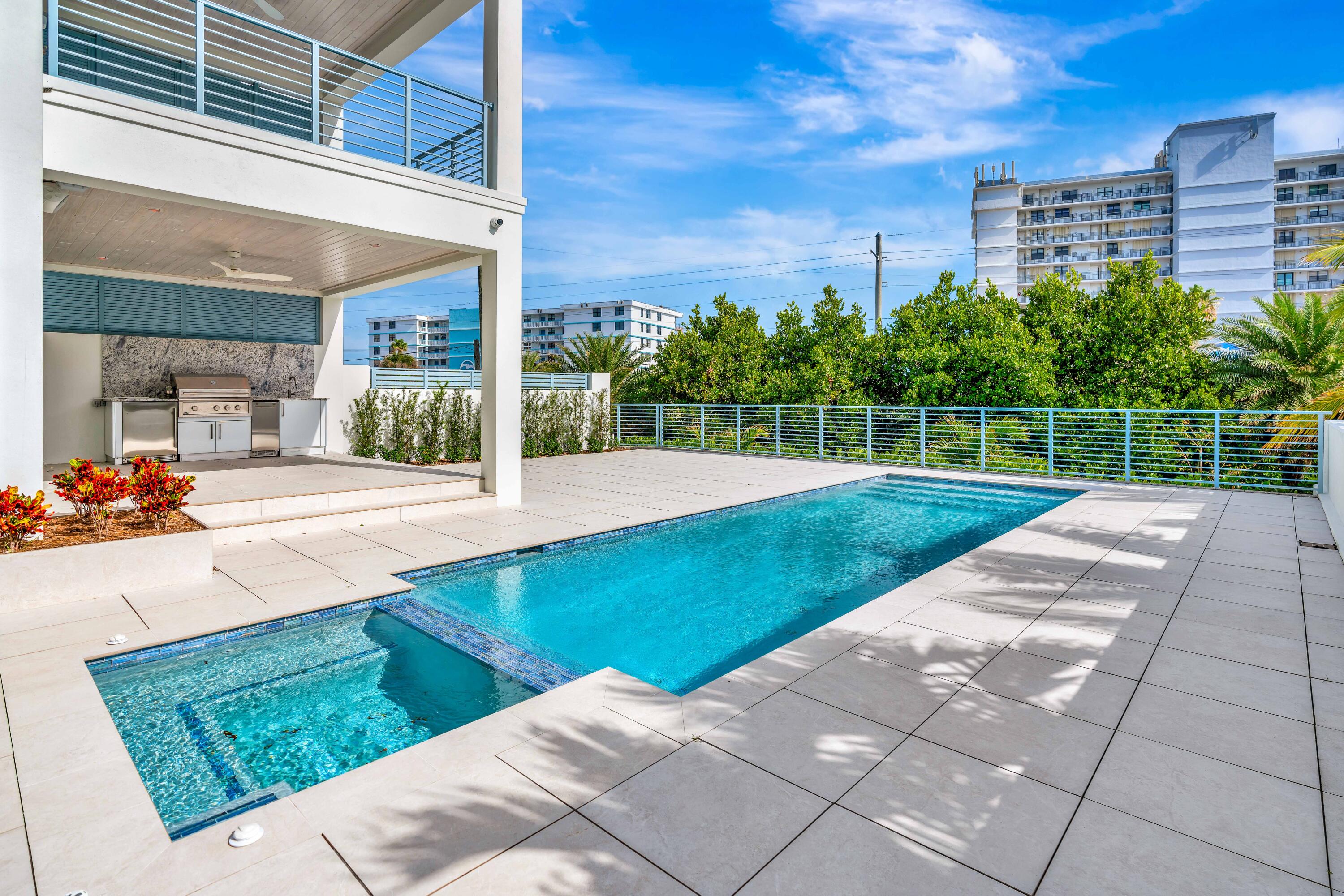 461 Venus Drive, Unit B Juno Beach, FL 33408 - Photo 70 of 85 a view of a backyard