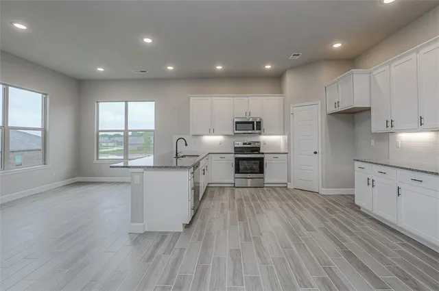 $477,000 | 8368 North Greentree Drive, Lenexa, KS 66227