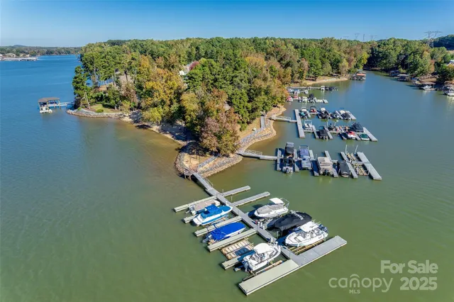 a building outdoor space with patio furniture and swimming pool