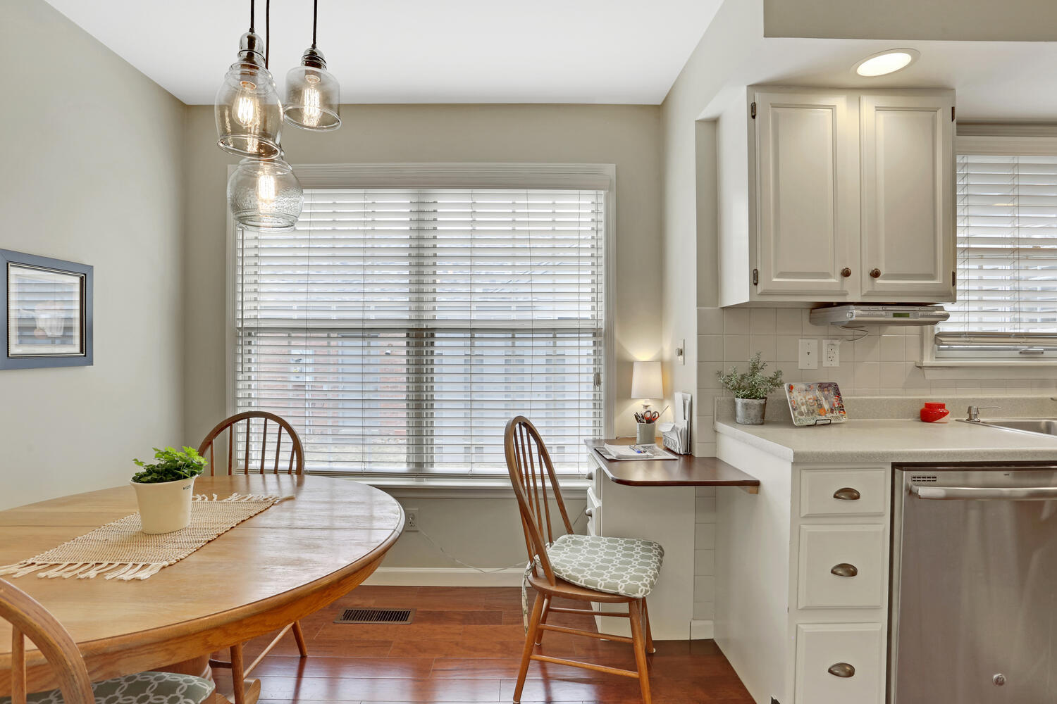 1727 Lakeside Drive, Unit B Champaign, IL 61821 - Photo 18 of 35 a view of a dining room with furniture and a chandelier