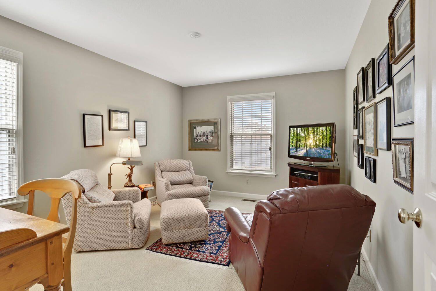 1727 Lakeside Drive, Unit B Champaign, IL 61821 - Photo 20 of 35 a living room with furniture and a window
