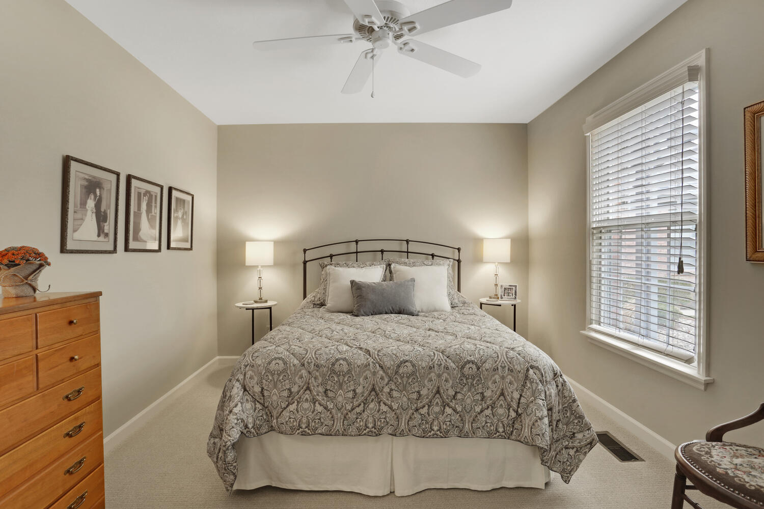 1727 Lakeside Drive, Unit B Champaign, IL 61821 - Photo 22 of 35 a bedroom with a large bed and a chandelier