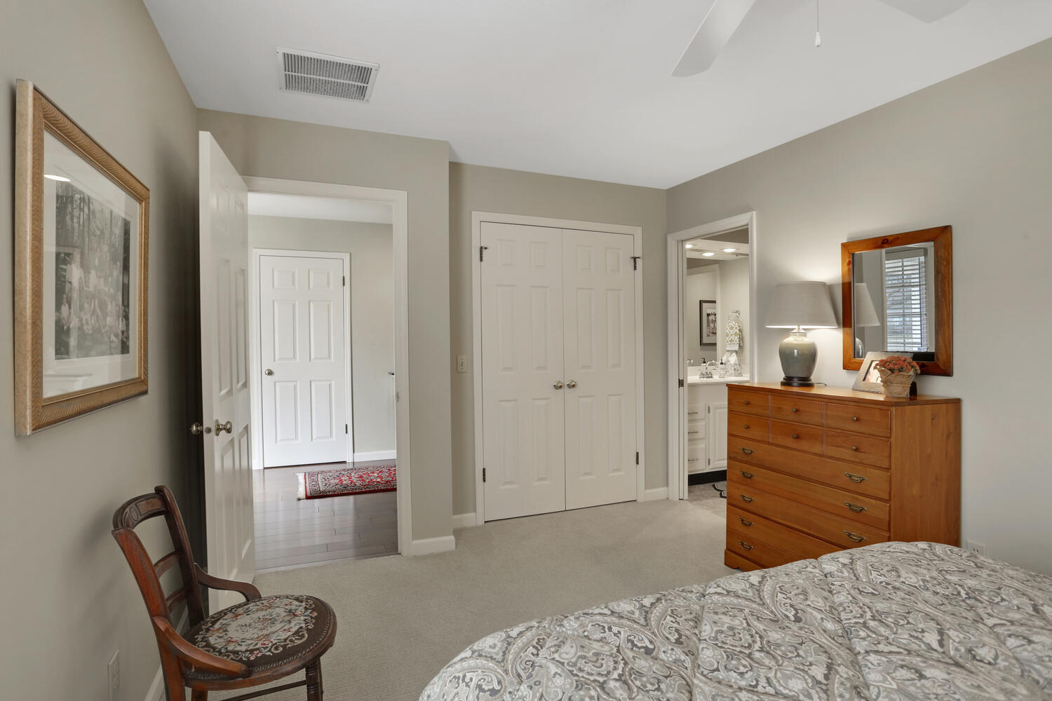 1727 Lakeside Drive, Unit B Champaign, IL 61821 - Photo 23 of 35 a bedroom with a bed and a dresser