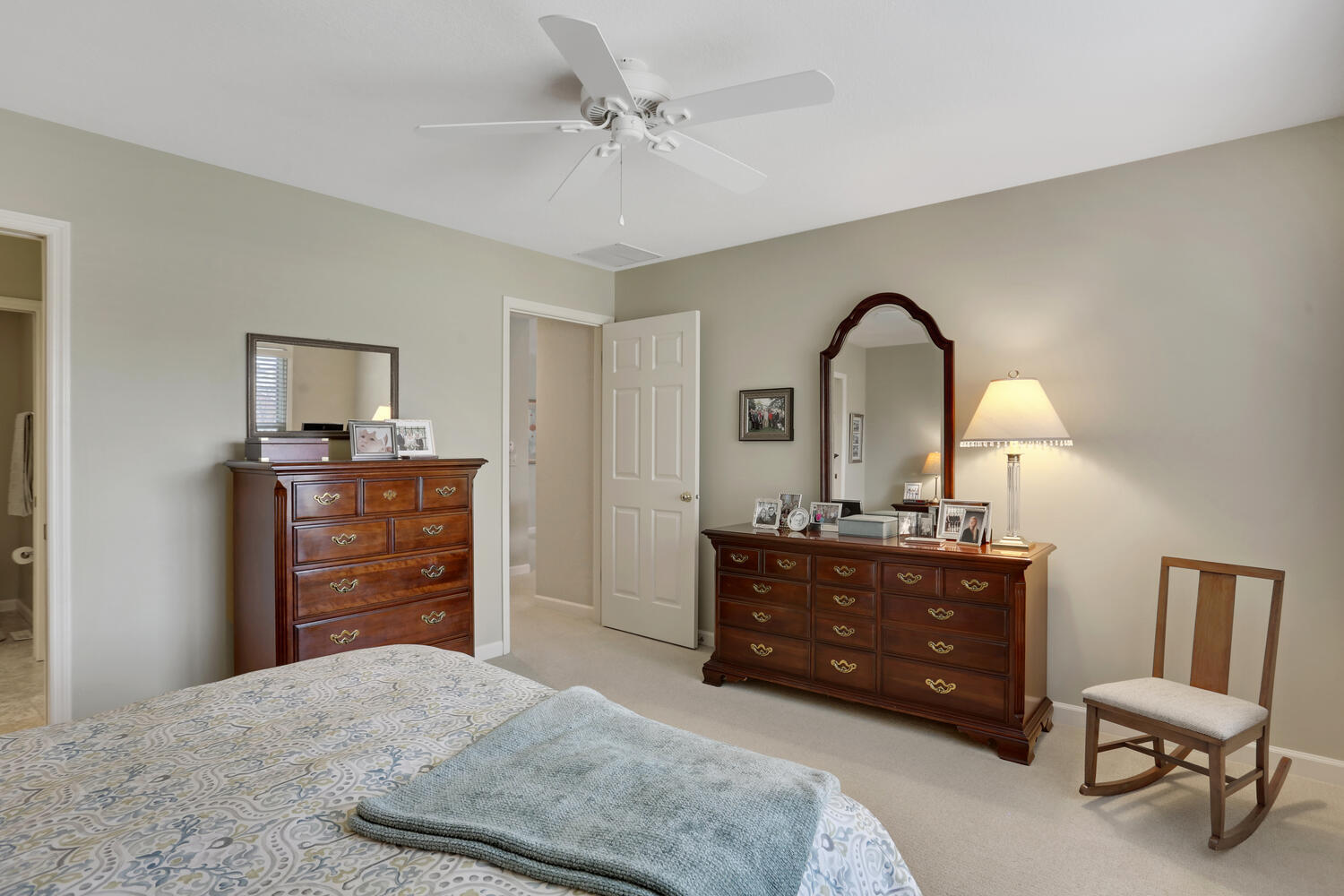 1727 Lakeside Drive, Unit B Champaign, IL 61821 - Photo 28 of 35 a bedroom with a bed and a dresser