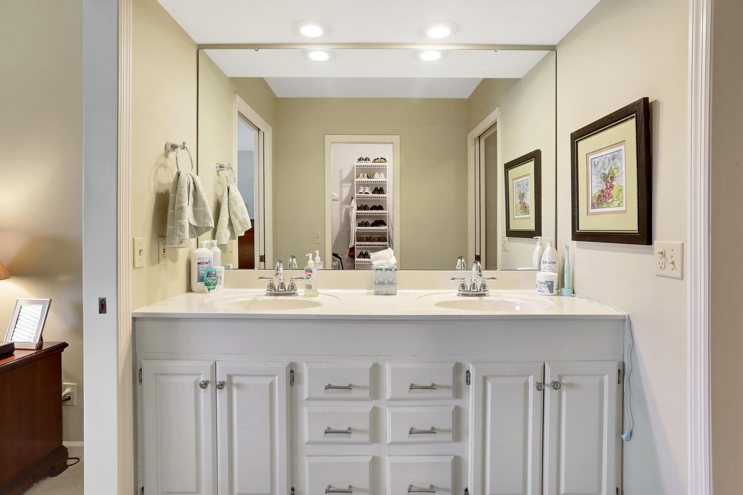 1727 Lakeside Drive, Unit B Champaign, IL 61821 - Photo 30 of 35 a bathroom with a sink and a mirror