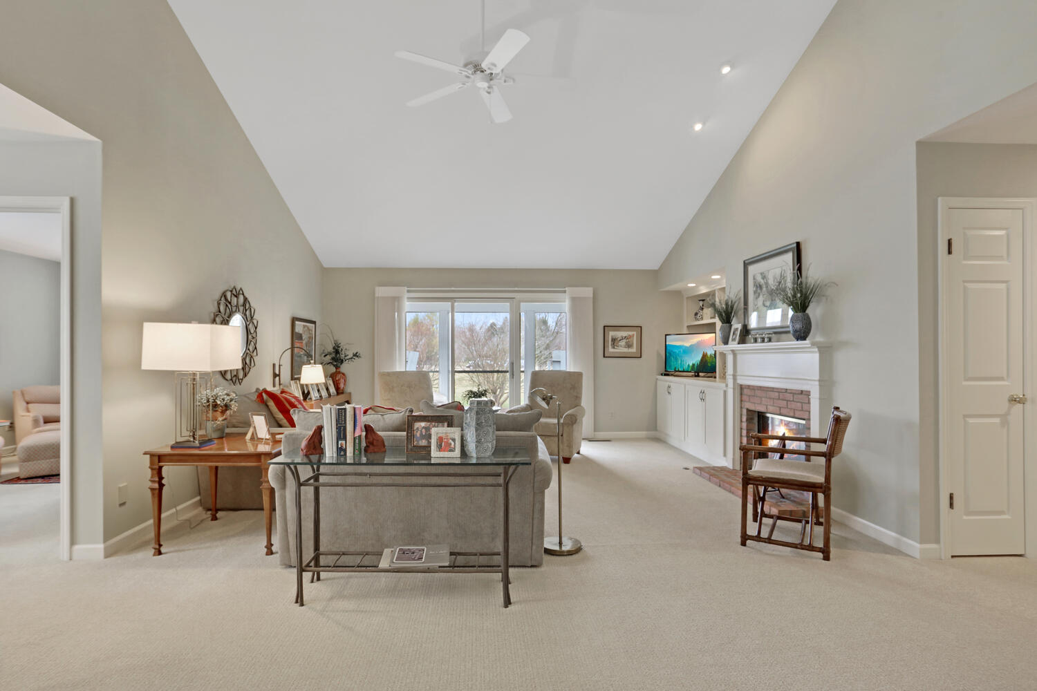 1727 Lakeside Drive, Unit B Champaign, IL 61821 - Photo 7 of 35 a living room with furniture and a flat screen tv